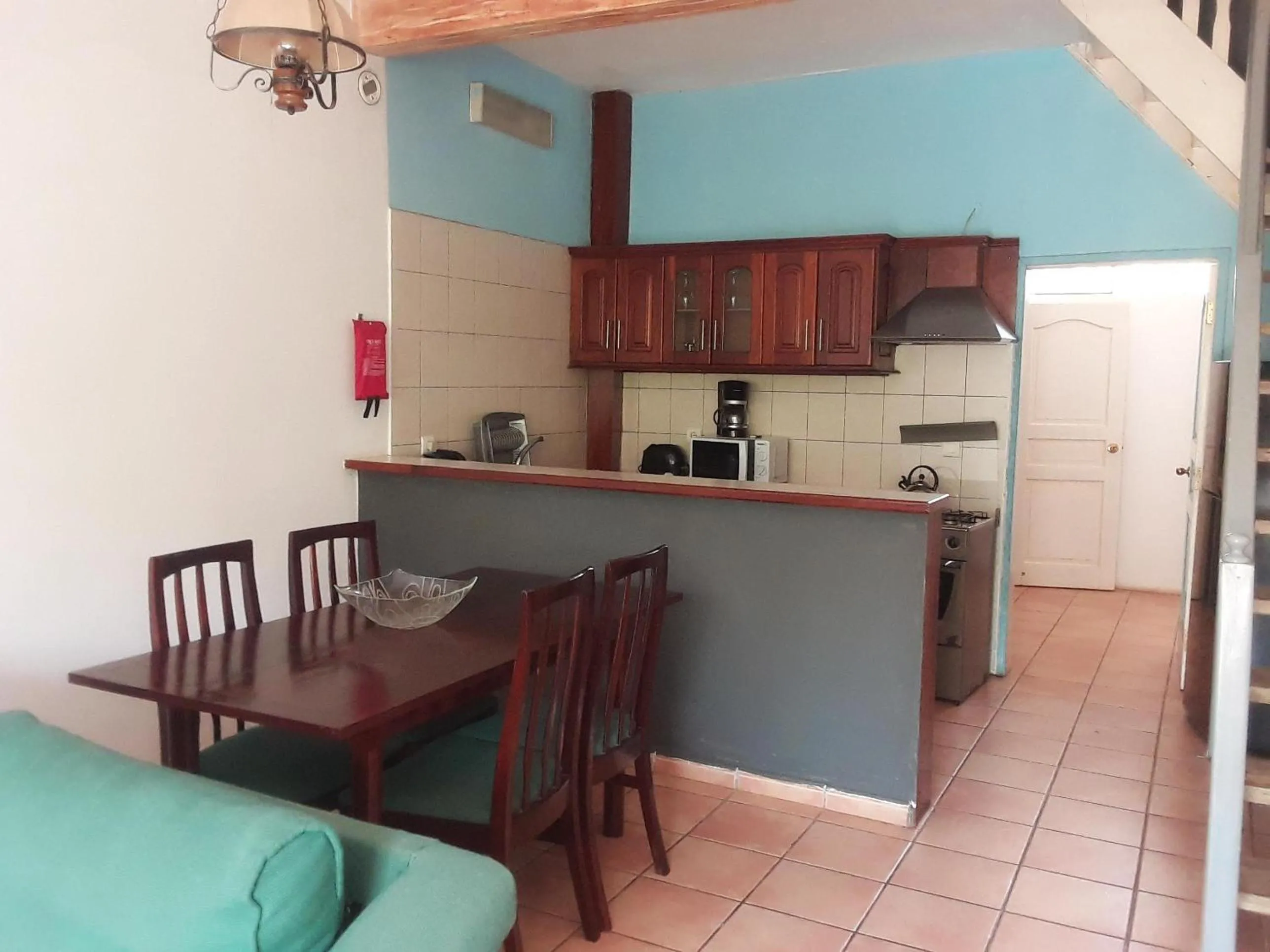 Kitchen or kitchenette in Riyan Apartment