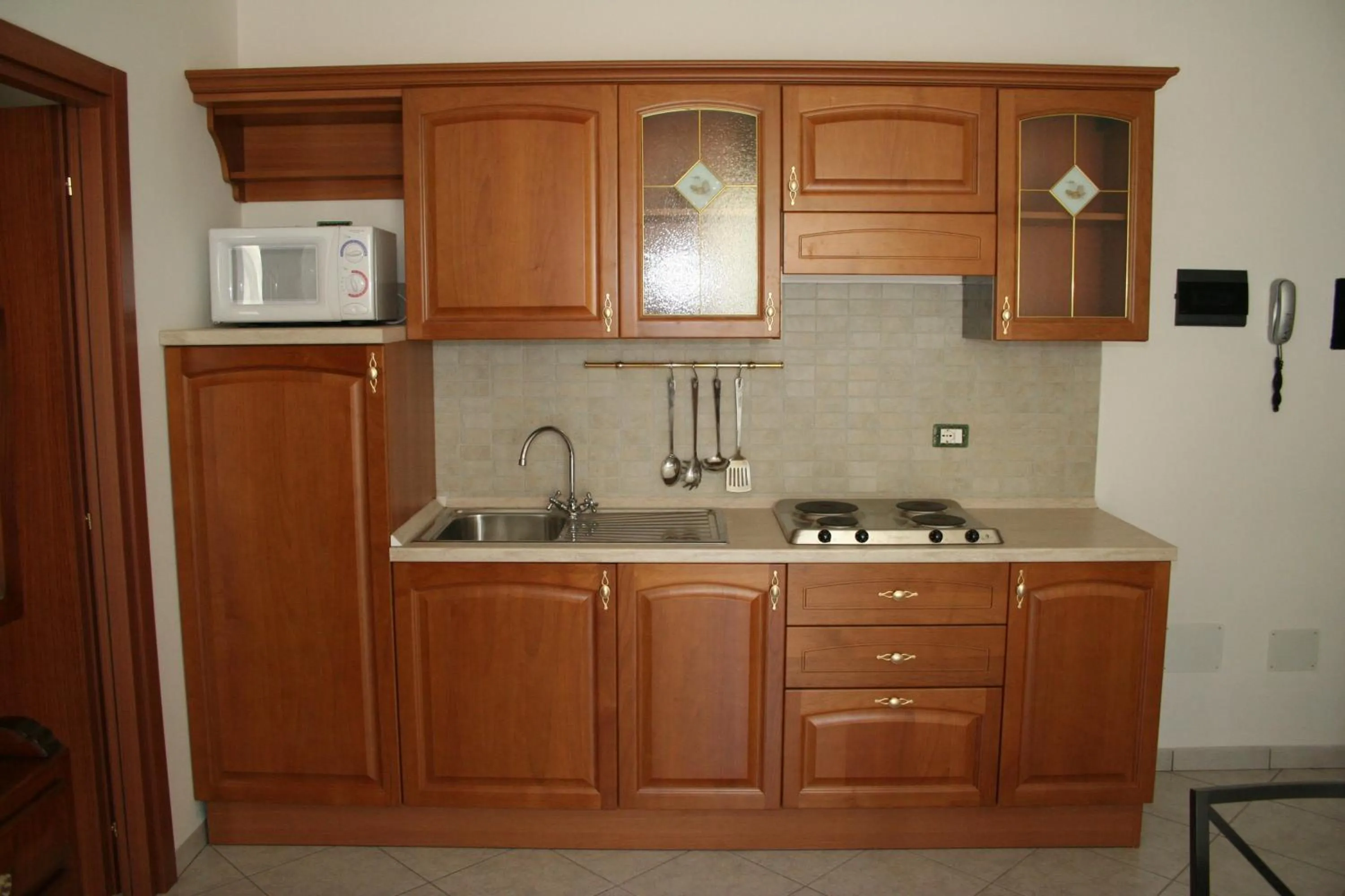 Kitchen or kitchenette in Residence Villa degli Ulivi