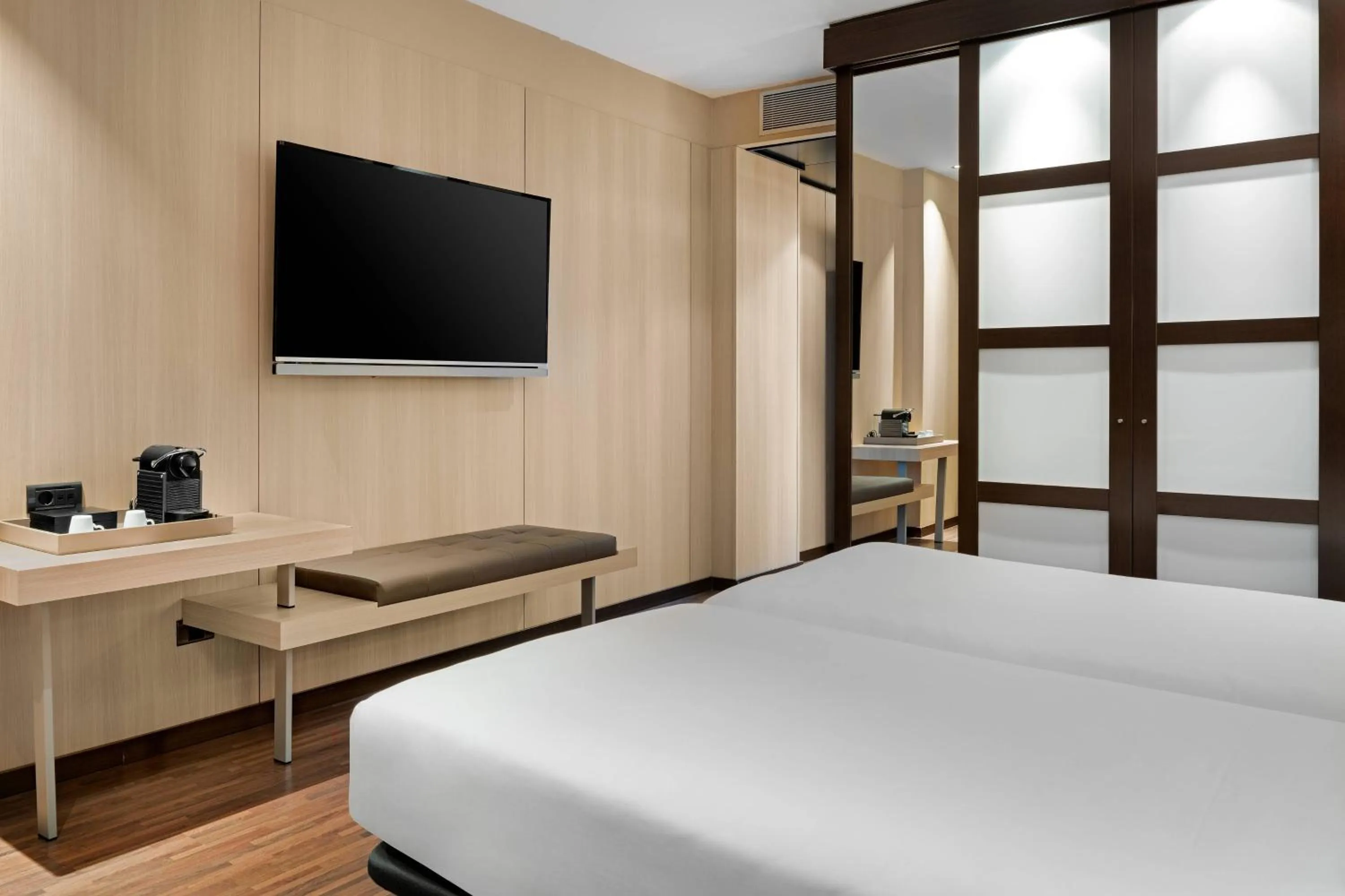 Photo of the whole room, Bed in AC Hotel Barcelona Fórum by Marriott