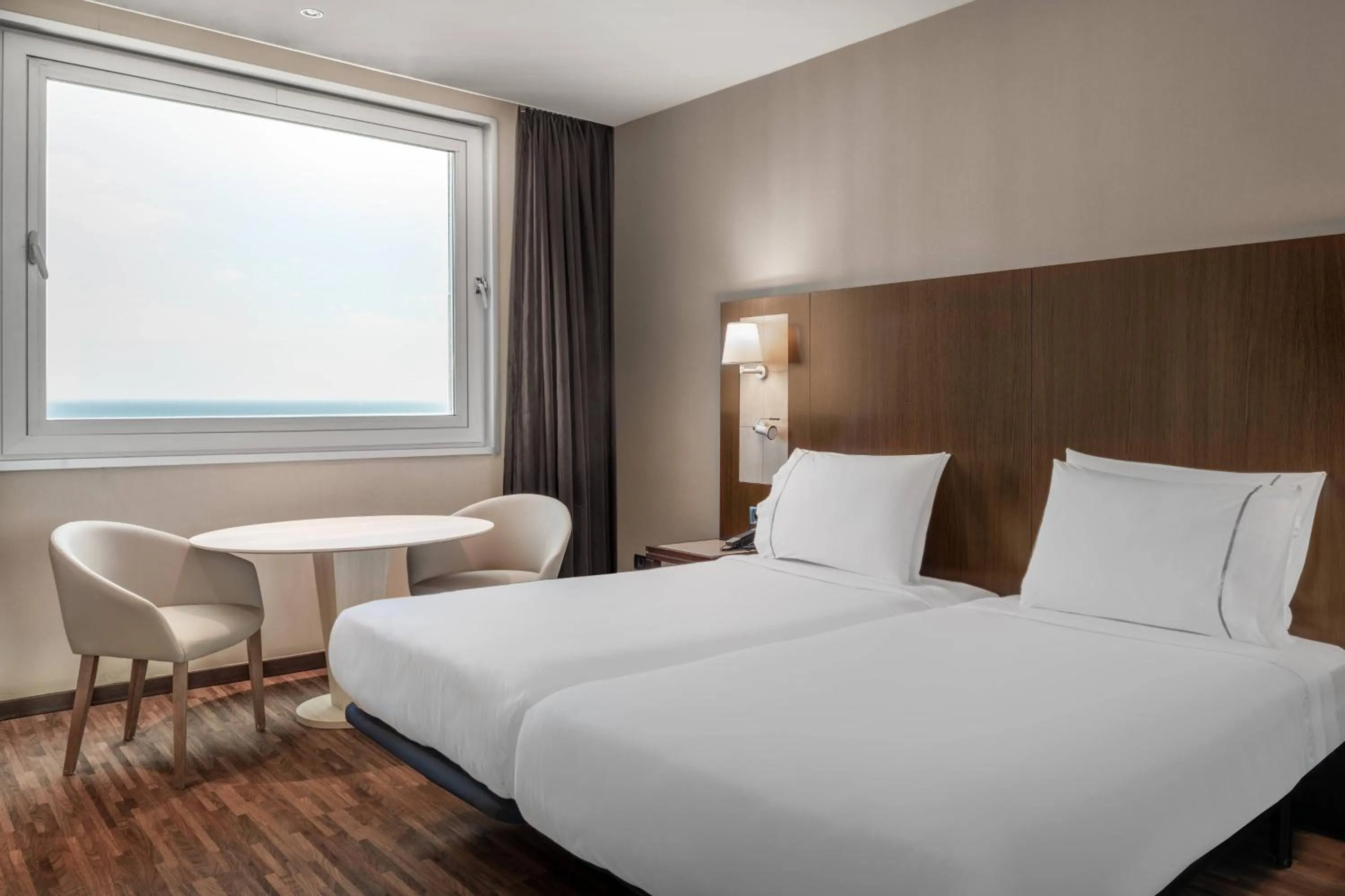 Photo of the whole room, Bed in AC Hotel Barcelona Fórum by Marriott