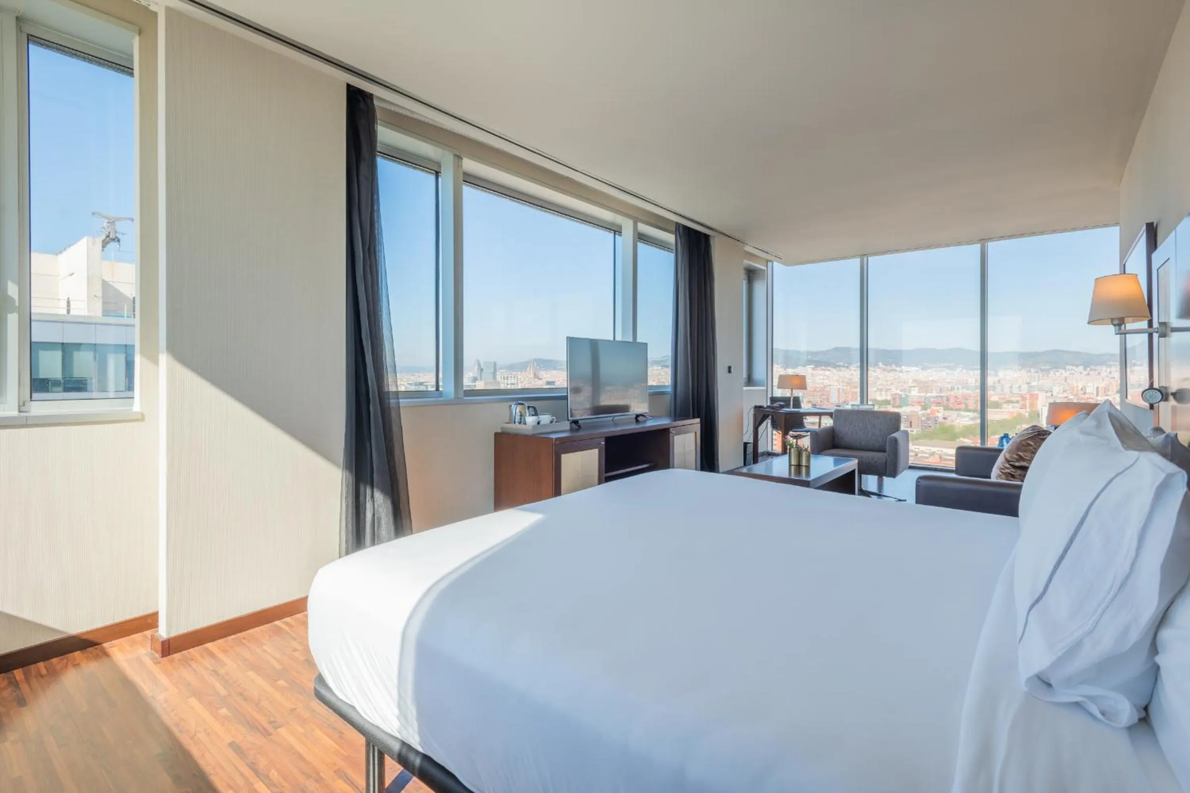 Bed in Leonardo Royal Hotel Barcelona Forum