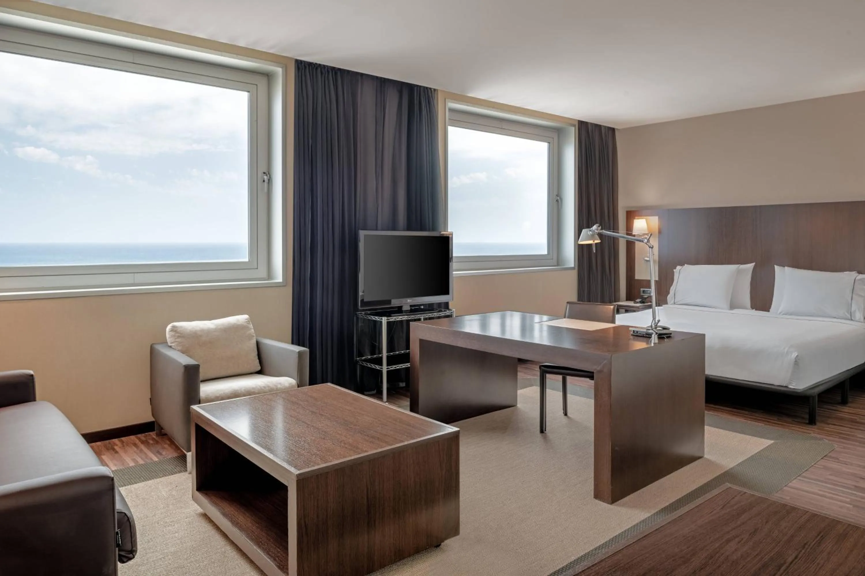 Photo of the whole room, Bed in AC Hotel Barcelona Fórum by Marriott