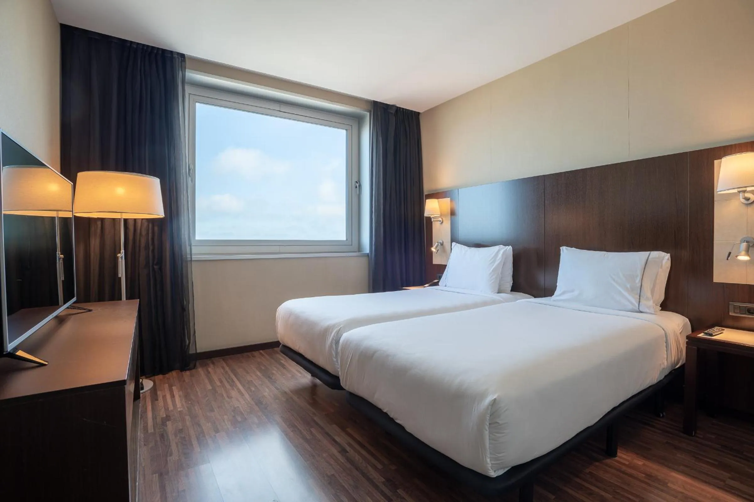 Bed in Leonardo Royal Hotel Barcelona Forum