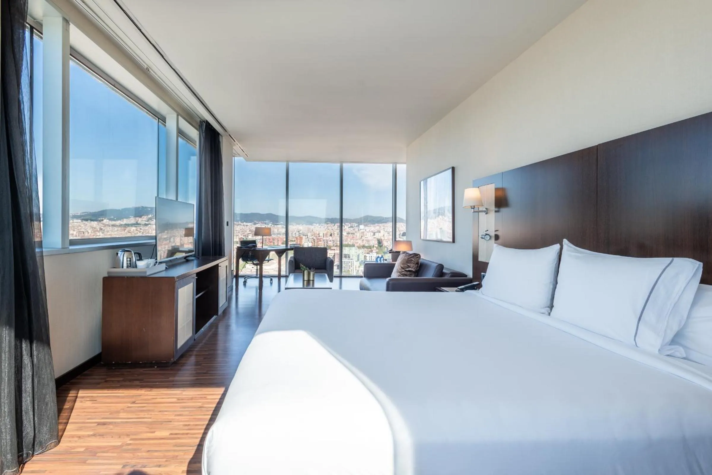 Bed in Leonardo Royal Hotel Barcelona Forum