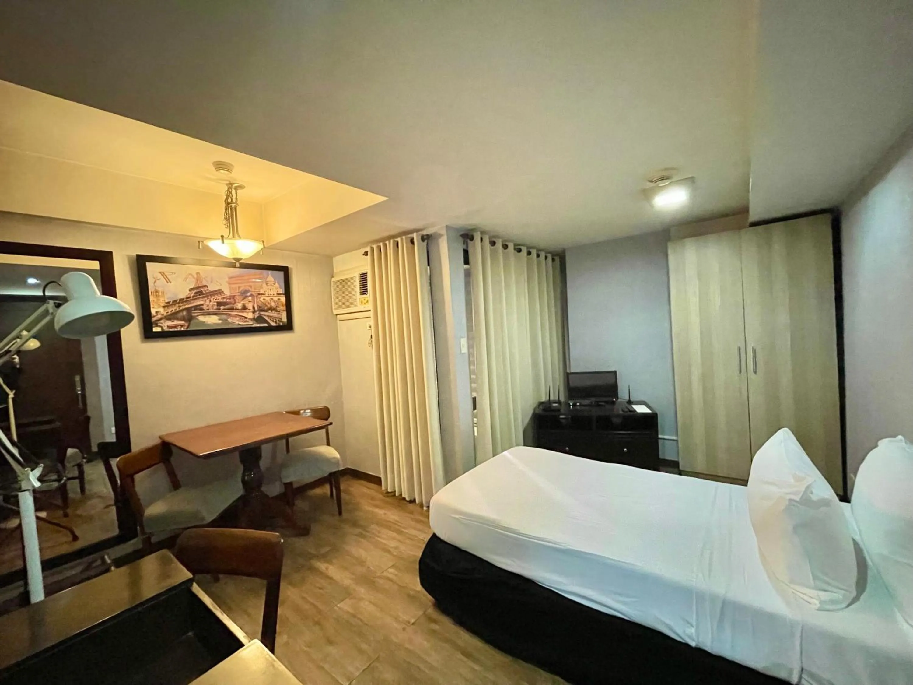 Photo of the whole room, Bed in CEO Flats