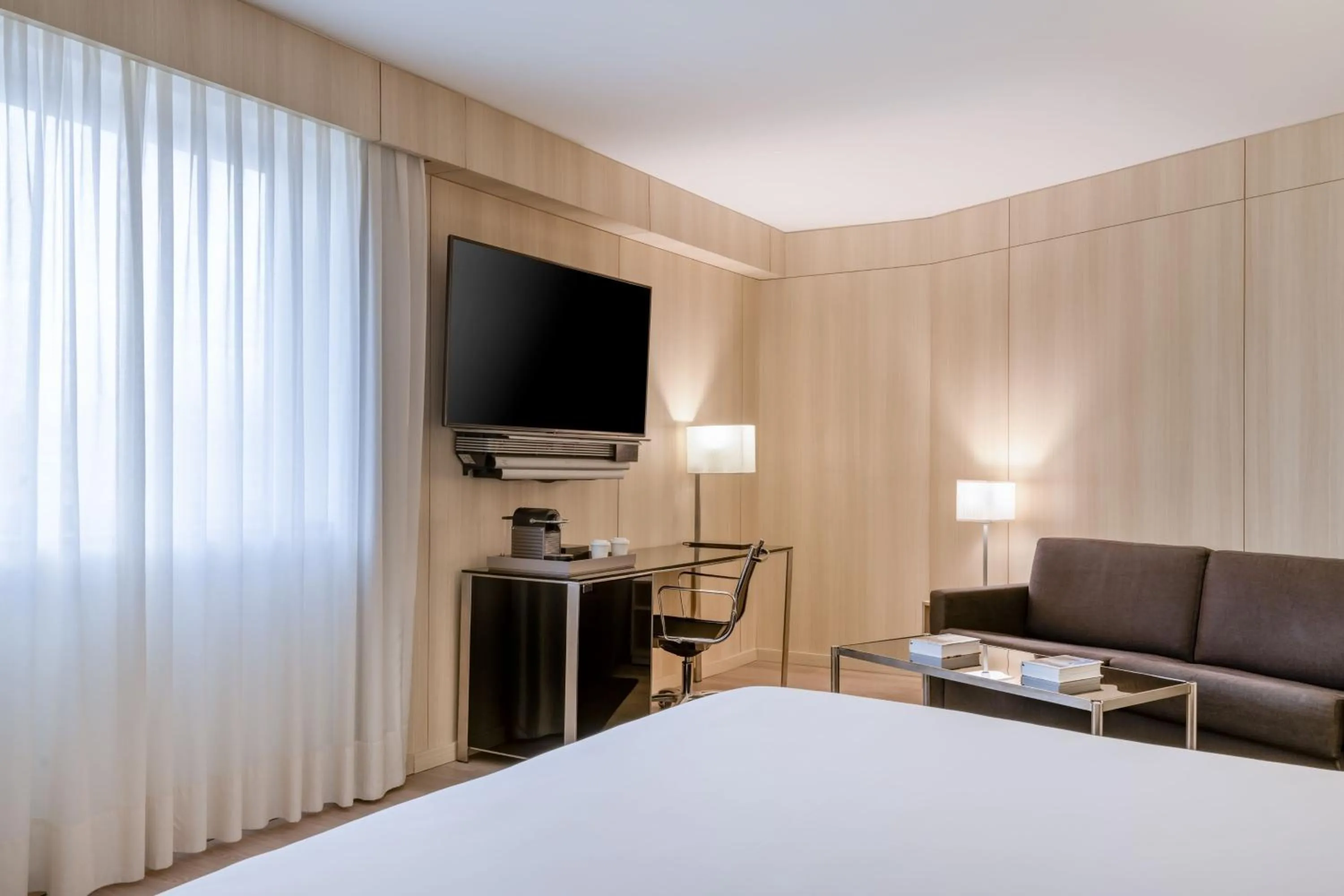 Photo of the whole room, Bed in AC Hotel Córdoba by Marriott