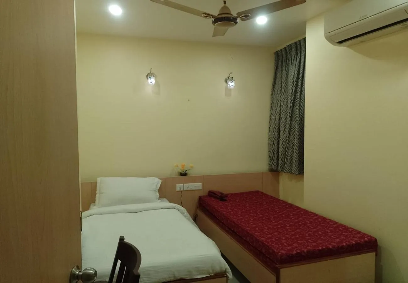Bed in Nadanam Inn