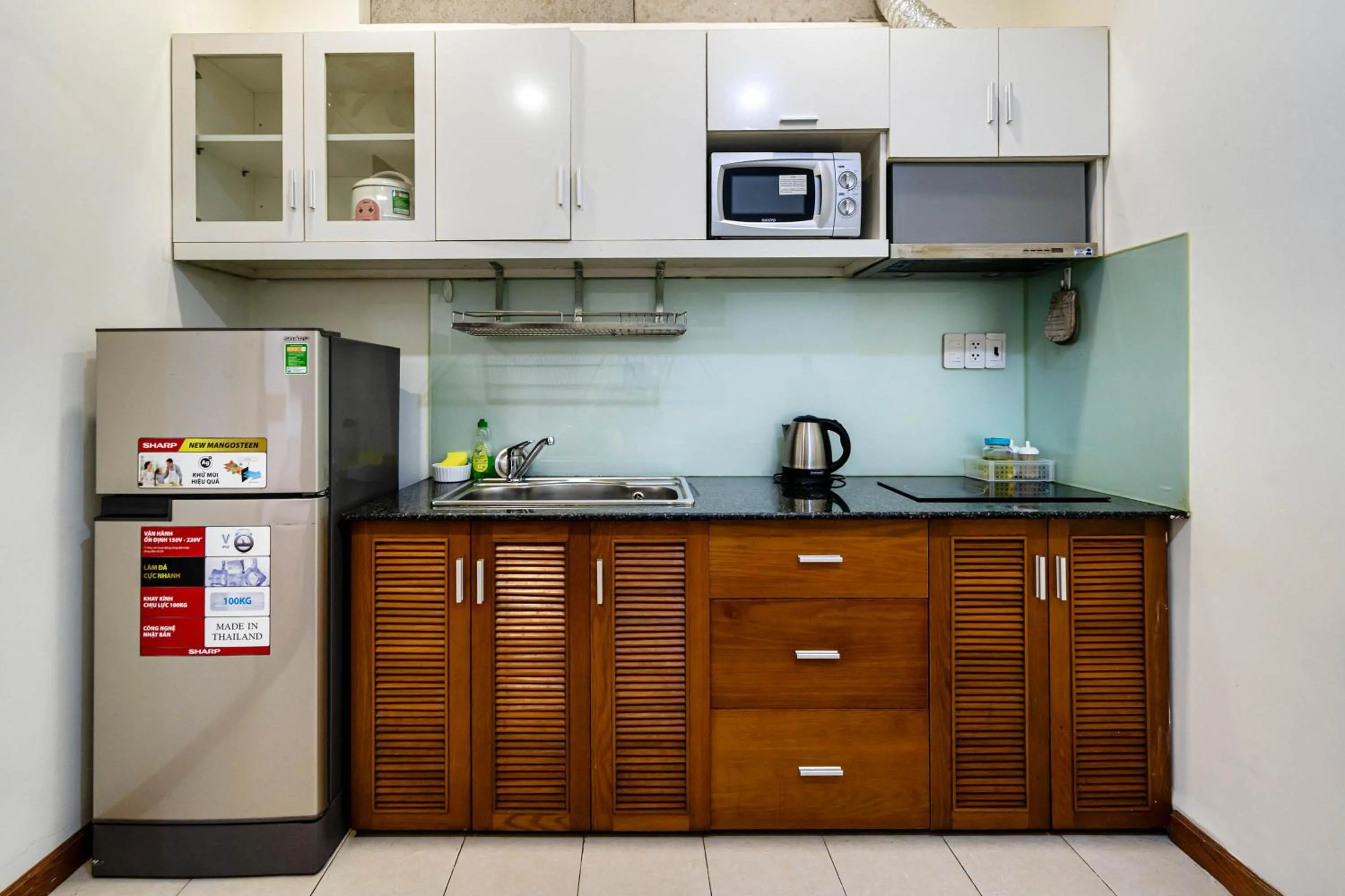 Kitchen or kitchenette in WE HOME Japan Town
