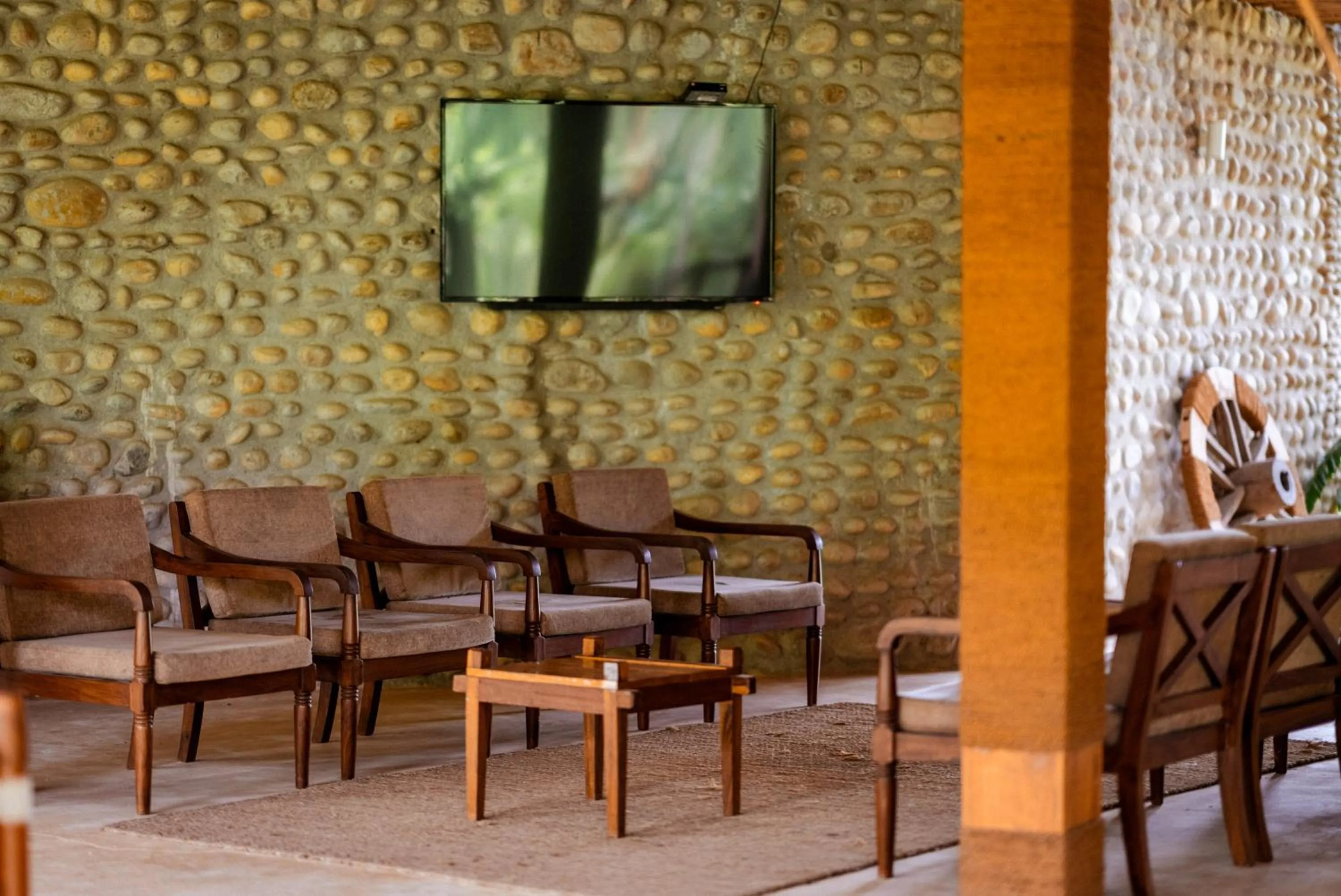 Communal lounge/ TV room in Sanctuary Chitwan National Park