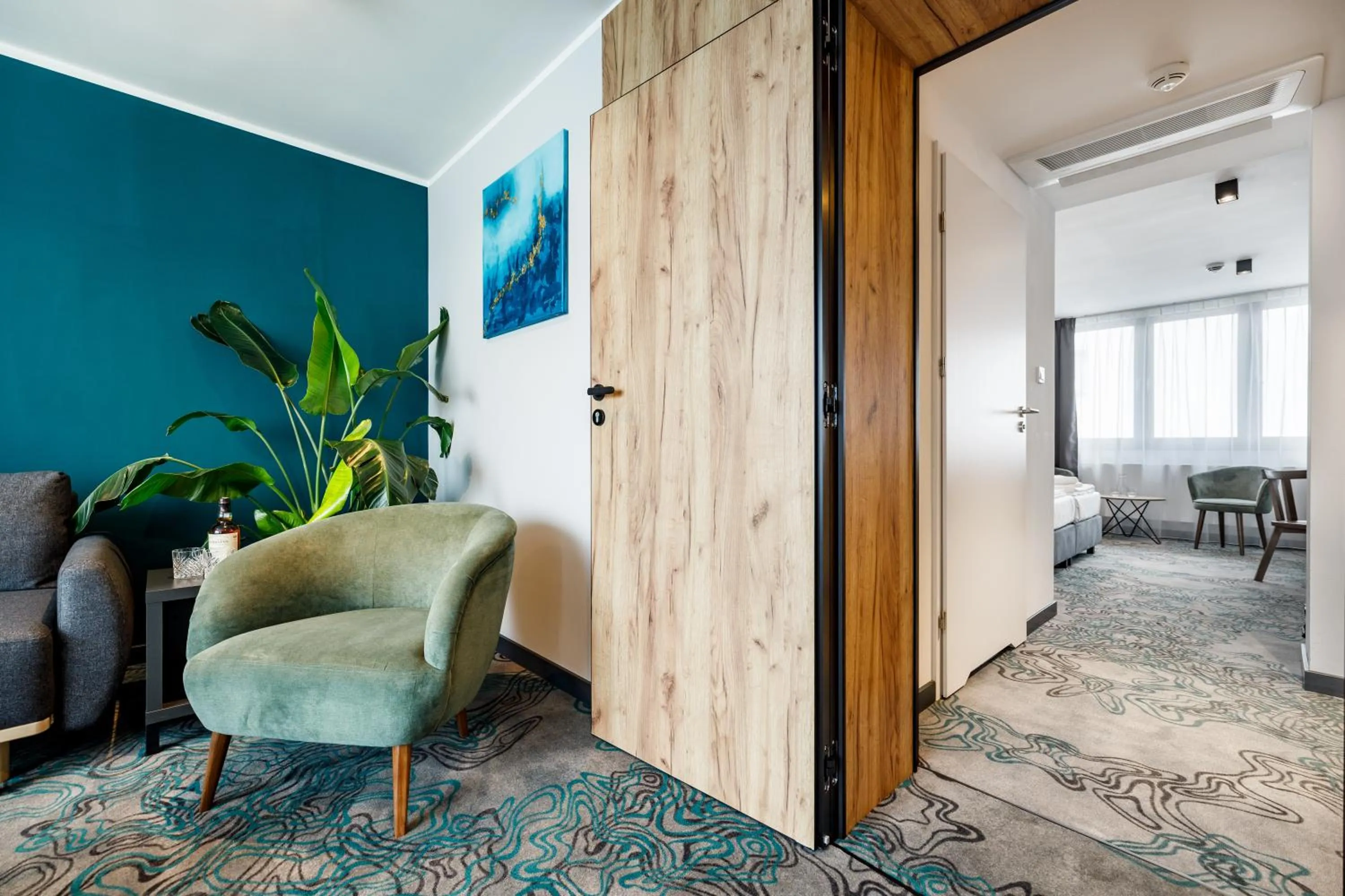 Communal lounge/ TV room in Hotel Kyriad Stargard