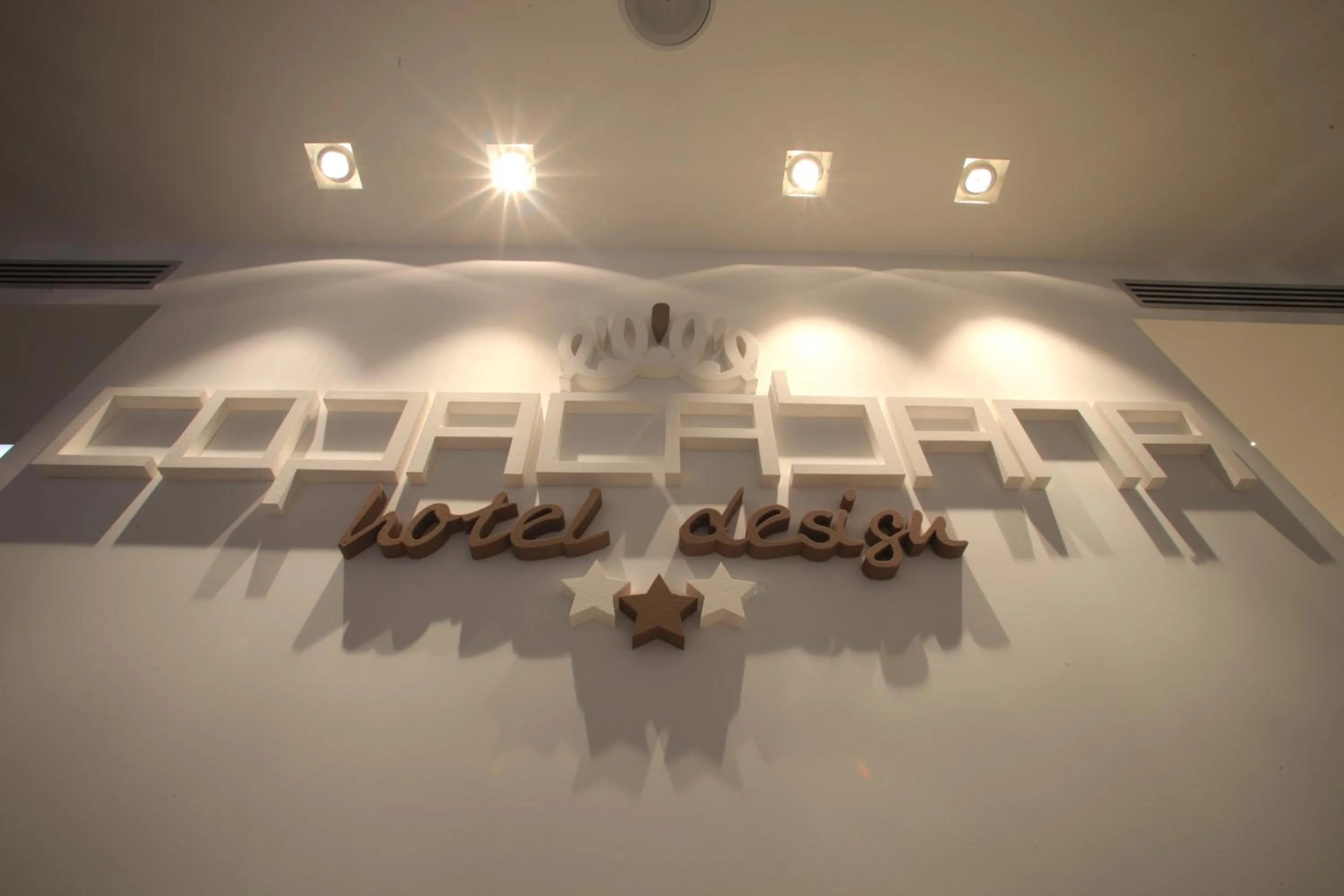 Property logo or sign in Copacabana Hotel Design