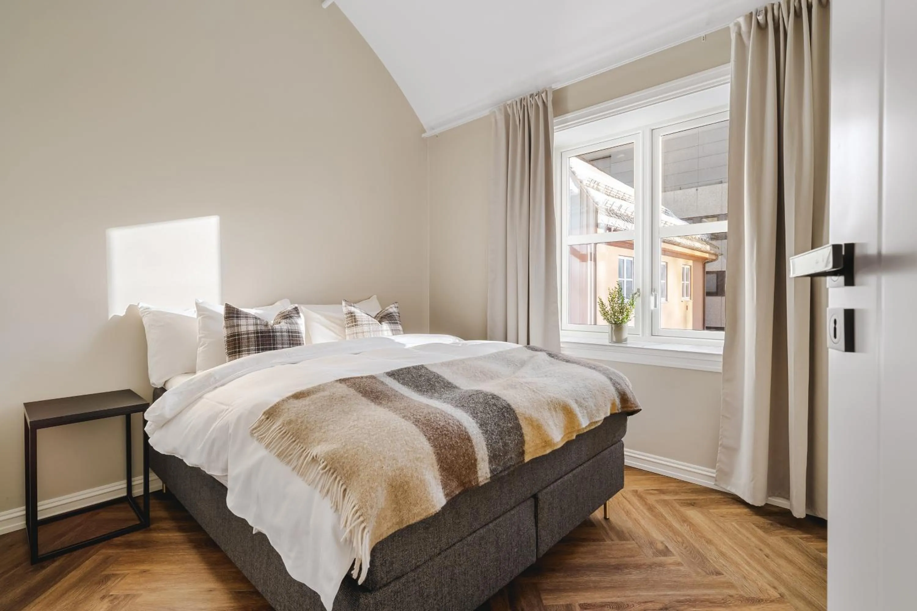 Bed in Enter St. Elisabeth Suites