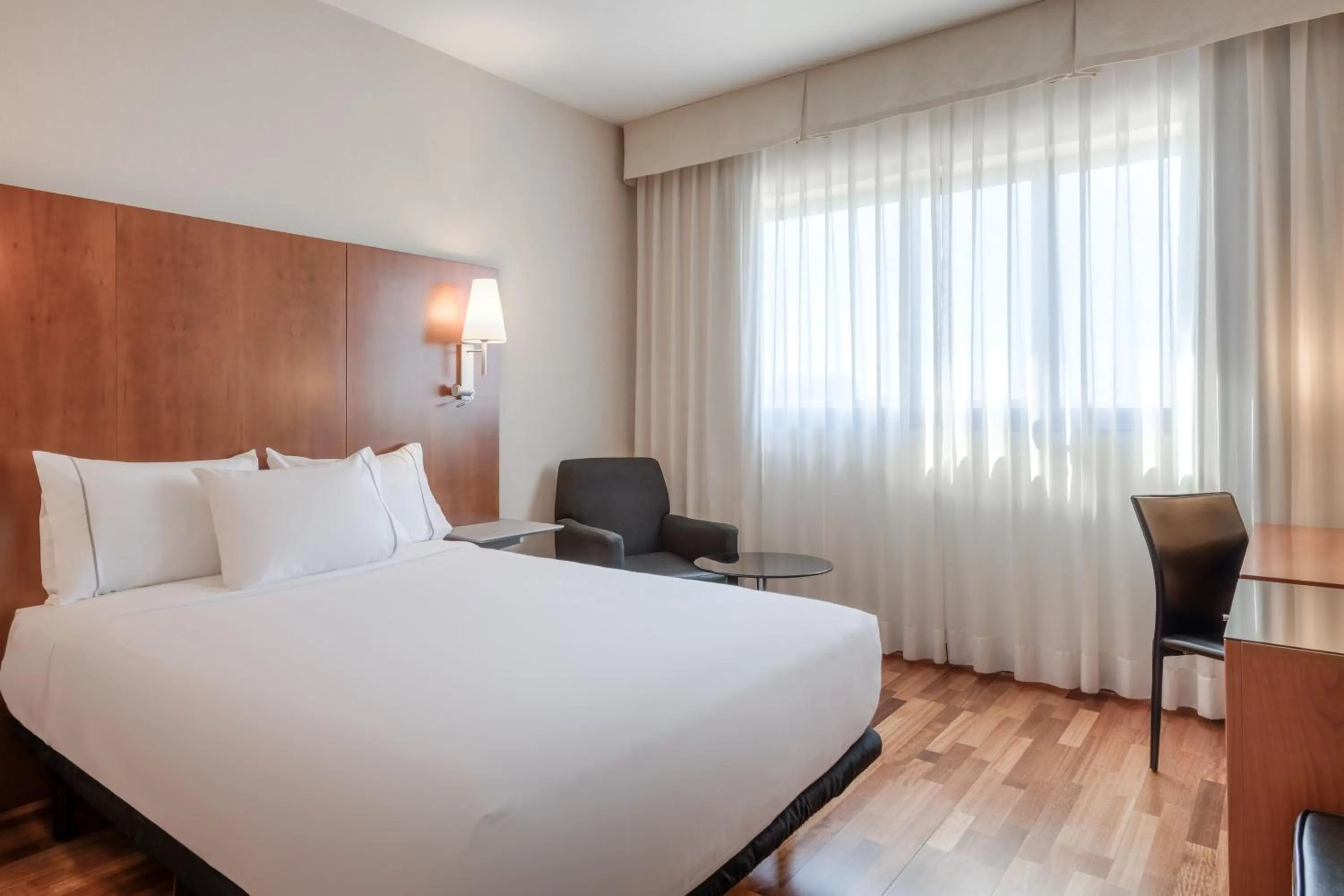 Photo of the whole room, Bed in AC Hotel Alcalá de Henares by Marriott