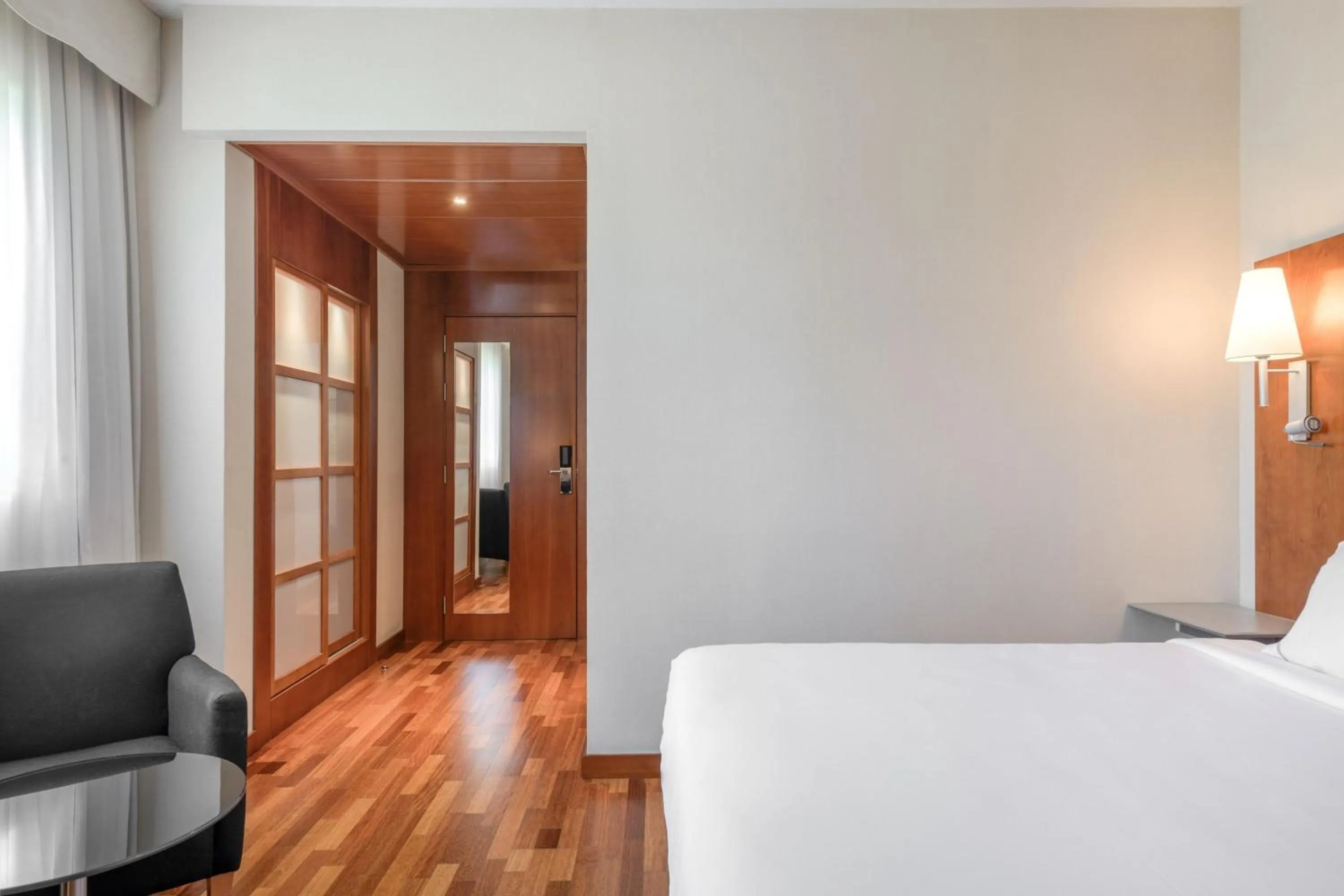 Photo of the whole room, Bed in AC Hotel Alcalá de Henares by Marriott