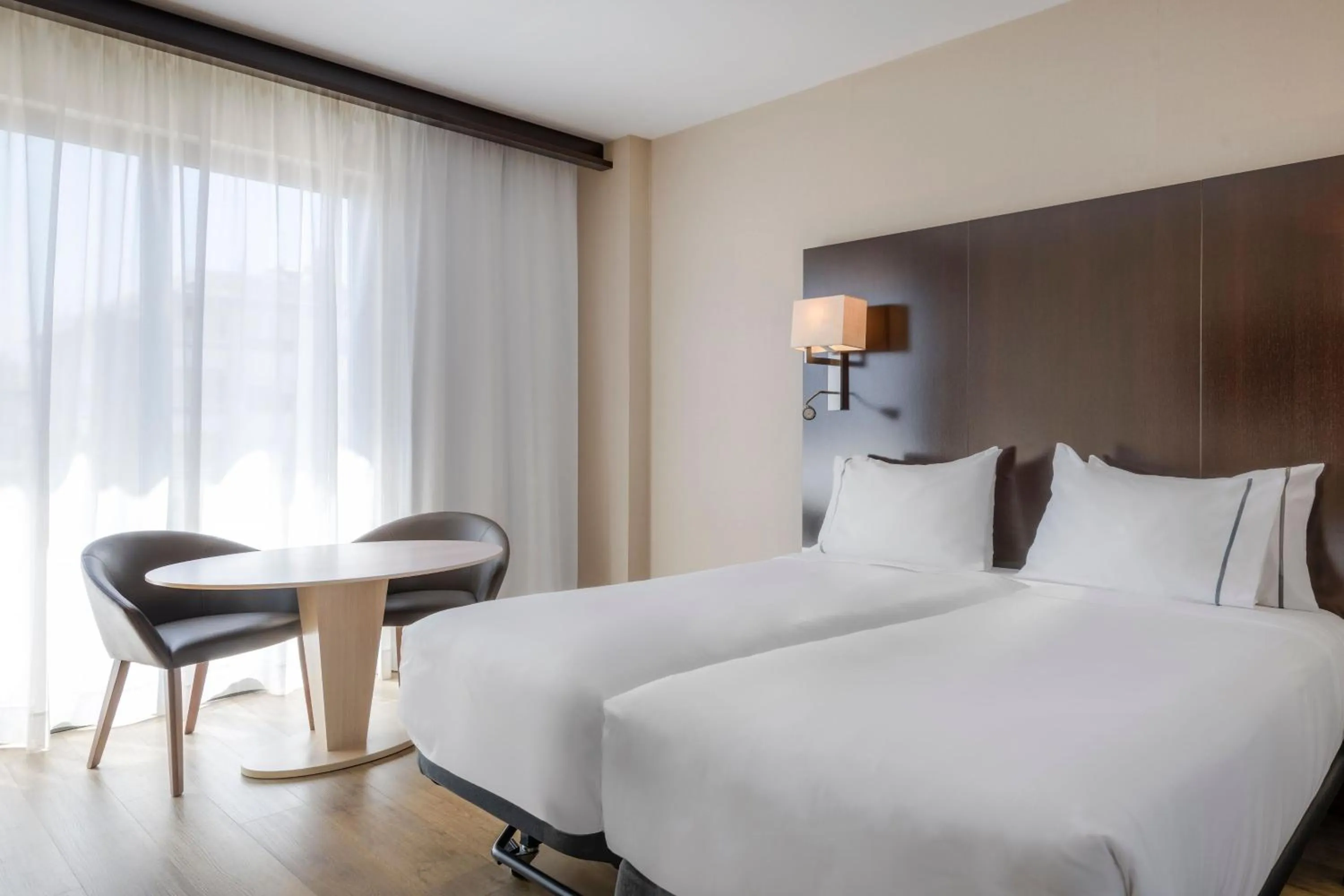 Photo of the whole room, Bed in AC Hotel Ciutat de Palma by Marriott