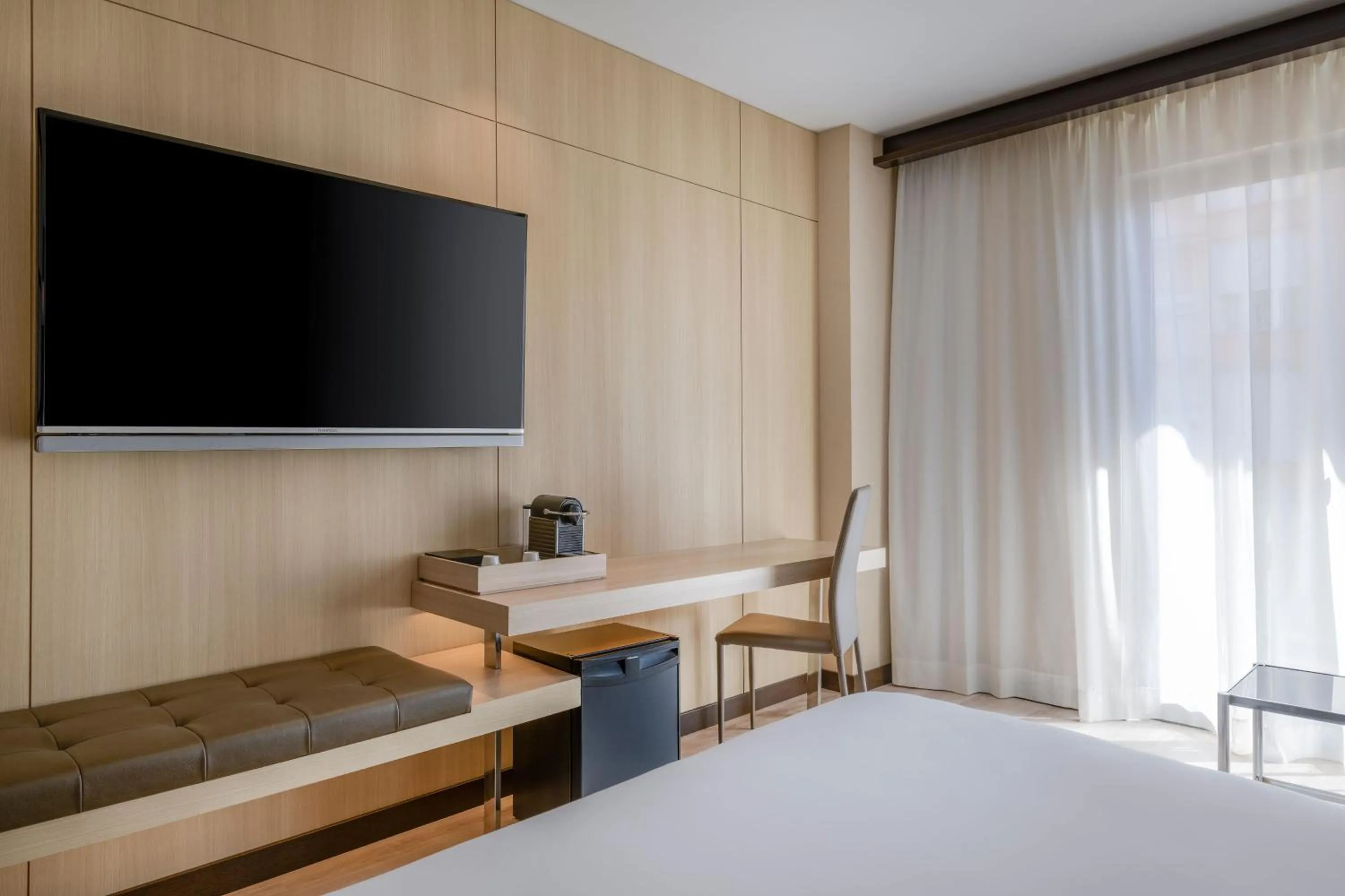 Photo of the whole room, Bed in AC Hotel Ciutat de Palma by Marriott