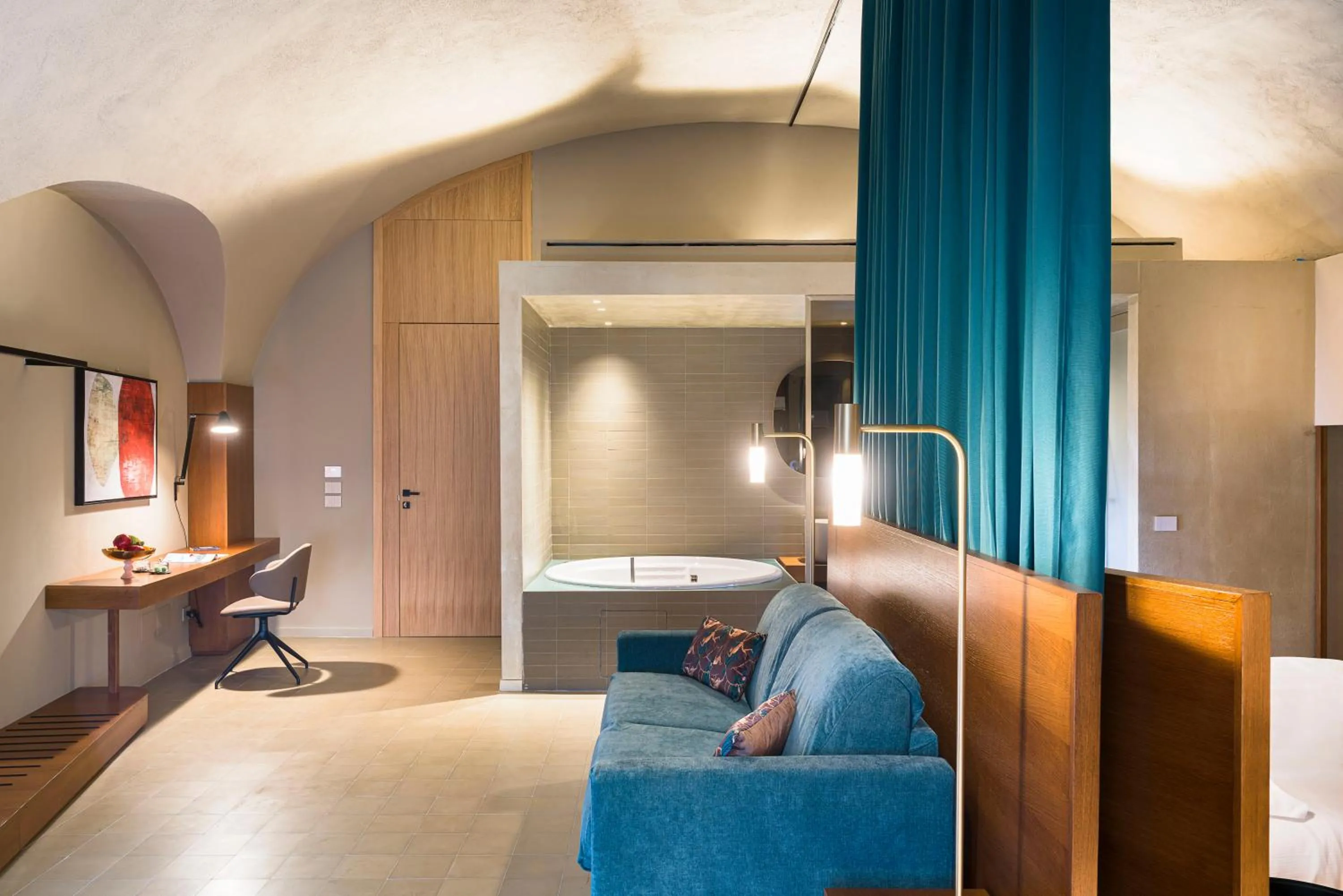 Seating area, Bed in BASTIÒ PRIVATE SUITES