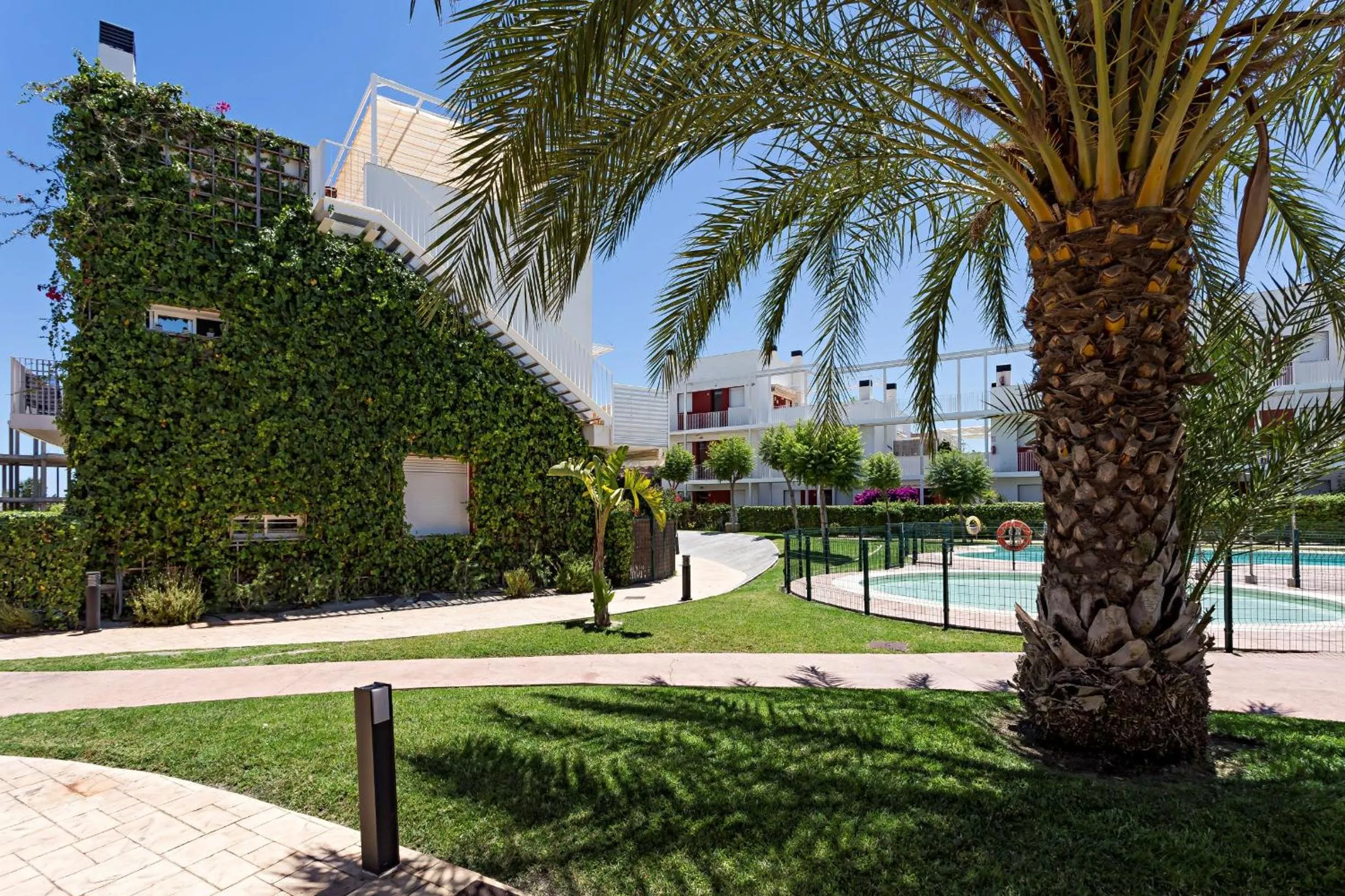 Garden in Apartamento "Casa el Sargazo" en Vera Playa con Piscina, Solarium, Wifi y Parking Gratis