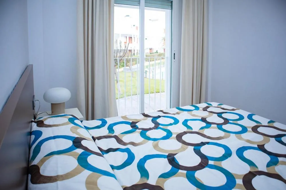 Bedroom, Bed in Apartamento "Casa el Sargazo" en Vera Playa con Piscina, Solarium, Wifi y Parking Gratis