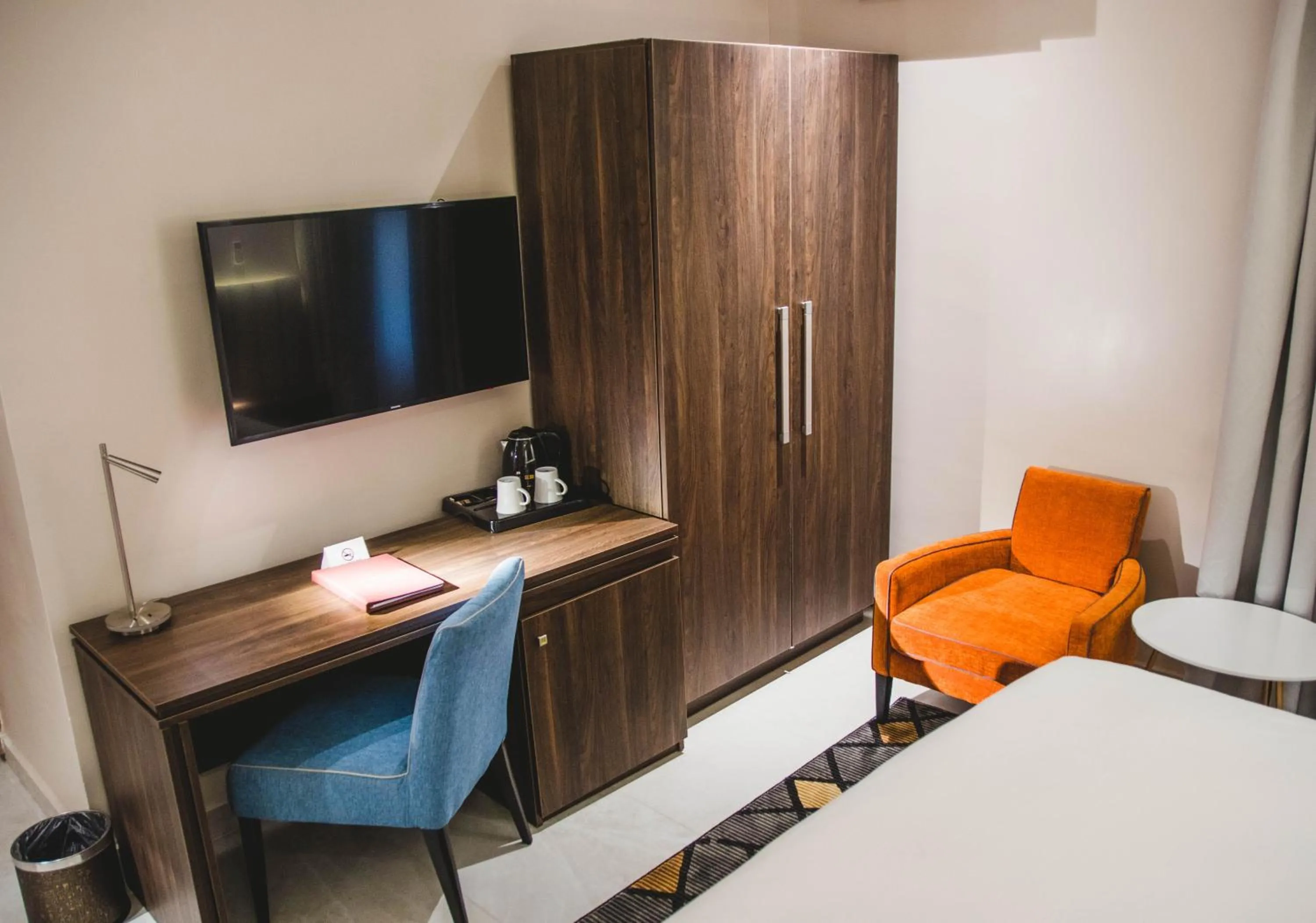 Bed in AMBER CITY HOTELS