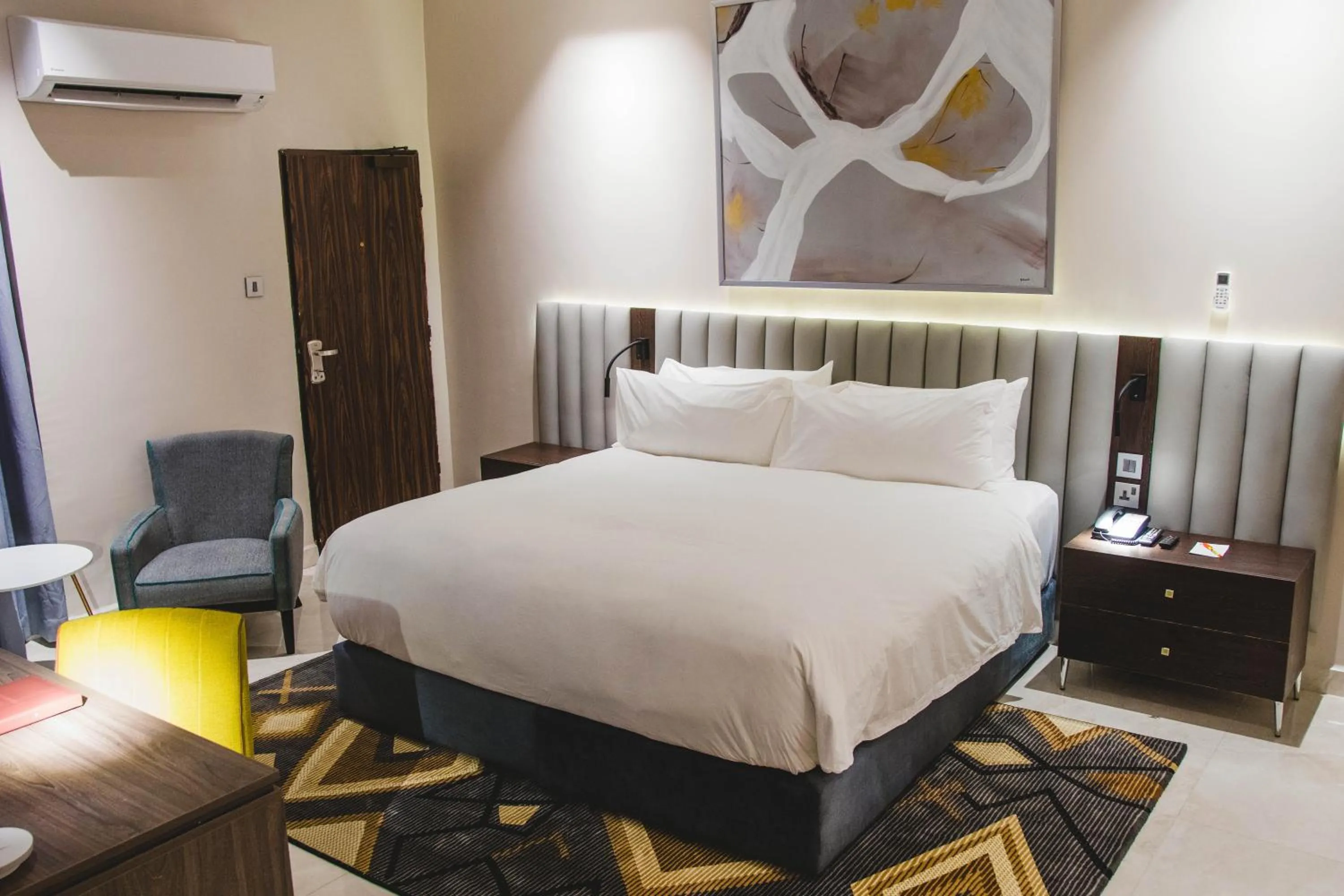 Bed in AMBER CITY HOTELS