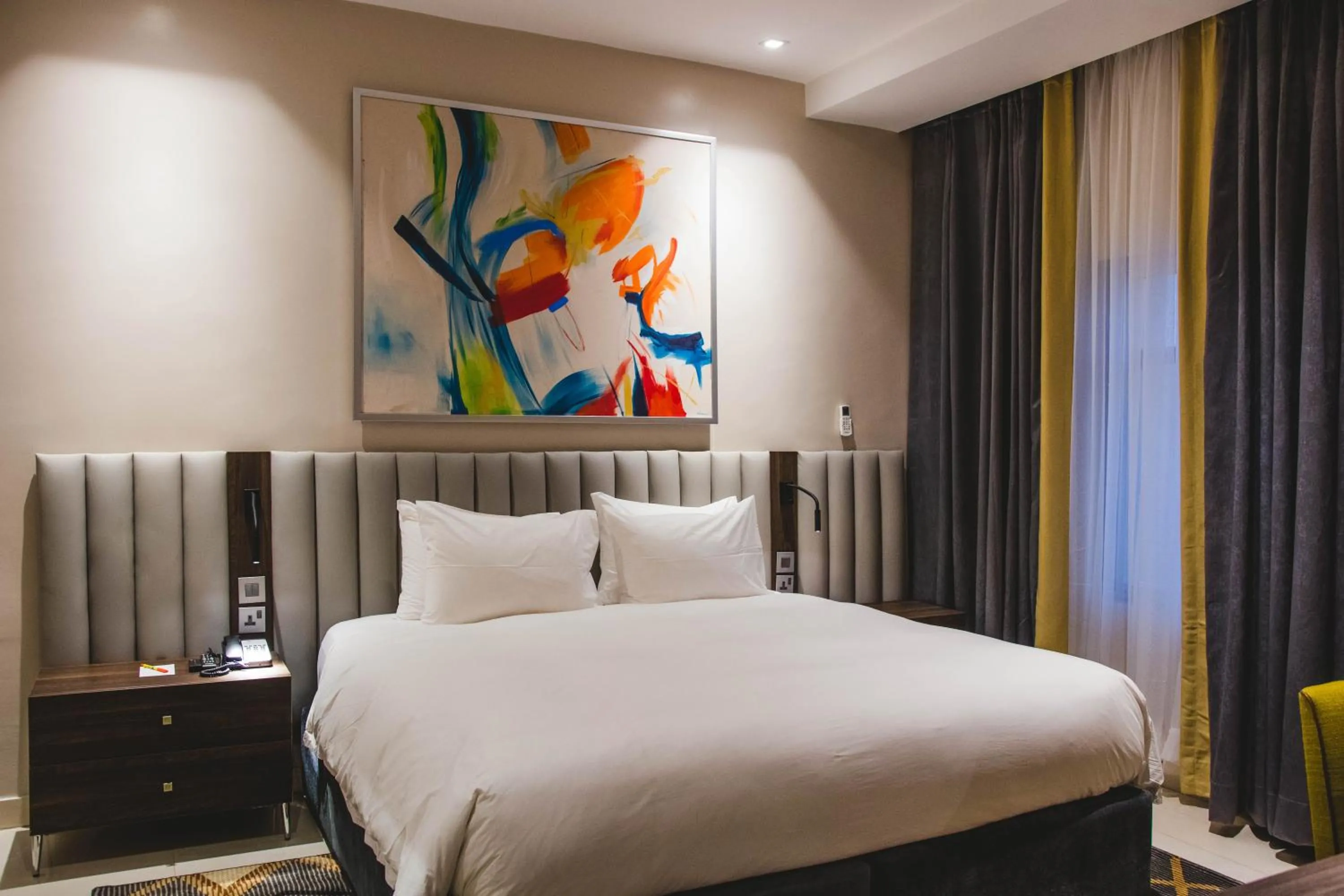 Bed in AMBER CITY HOTELS