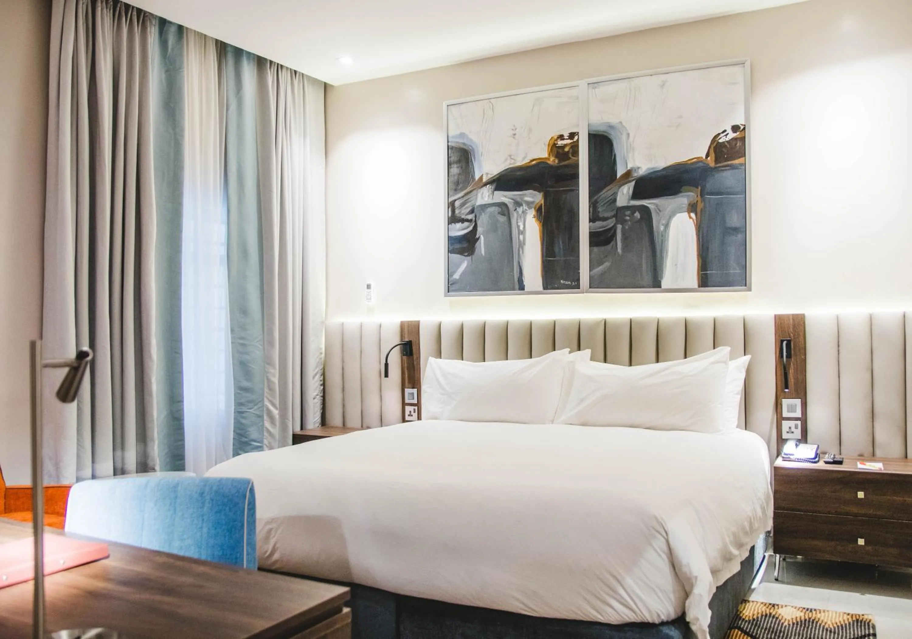 Bed in AMBER CITY HOTELS