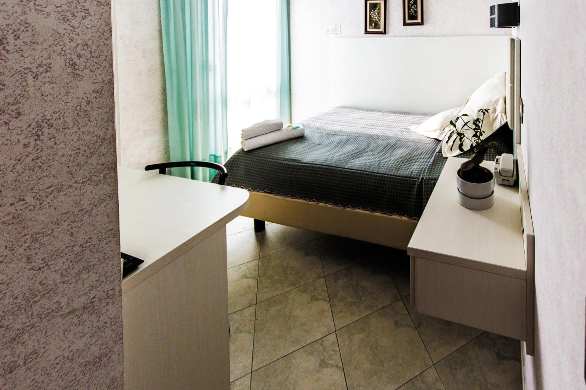 Bedroom in Hotel Baviera