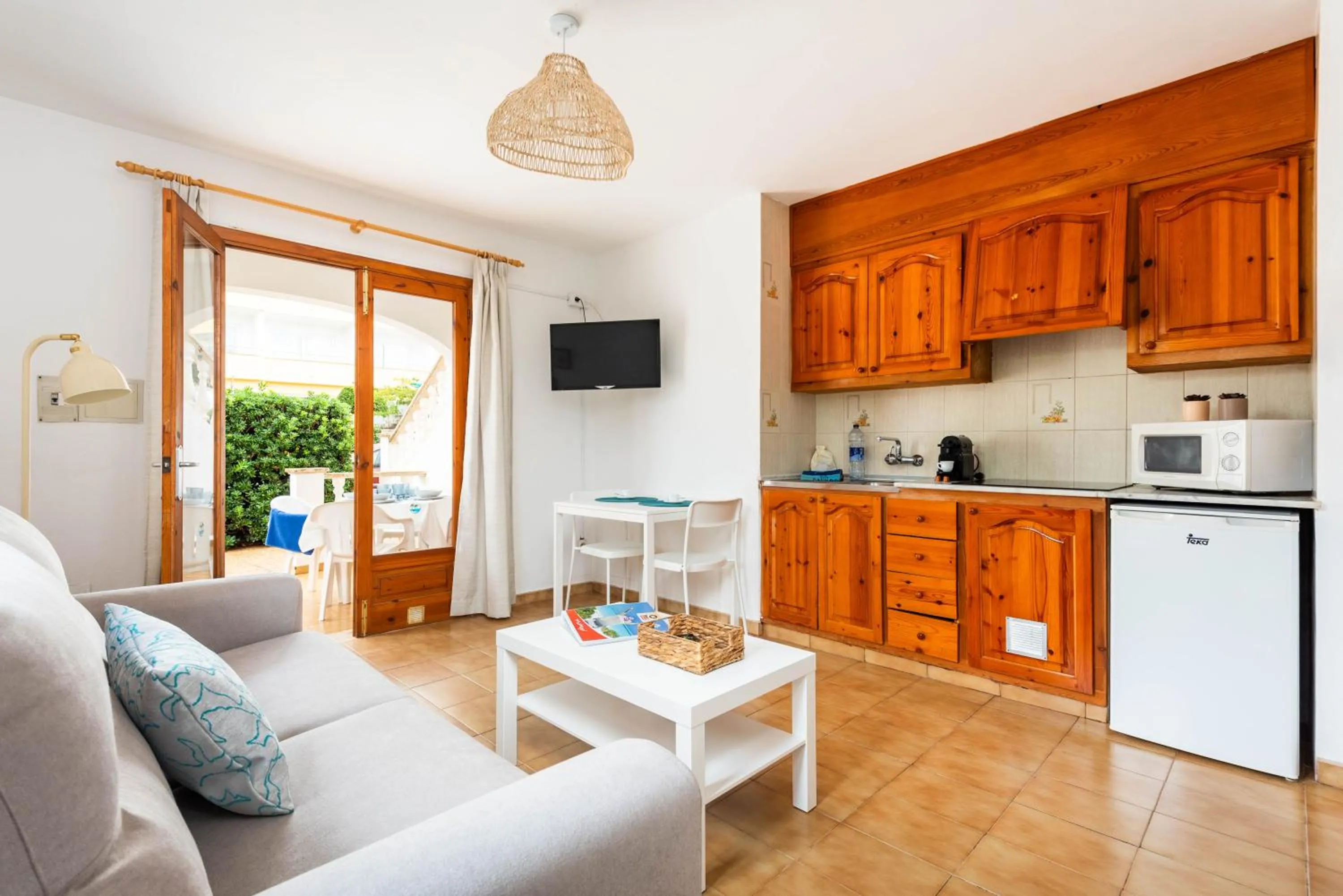 TV and multimedia in Apartamentos Mar Blanca by Mauter Villas