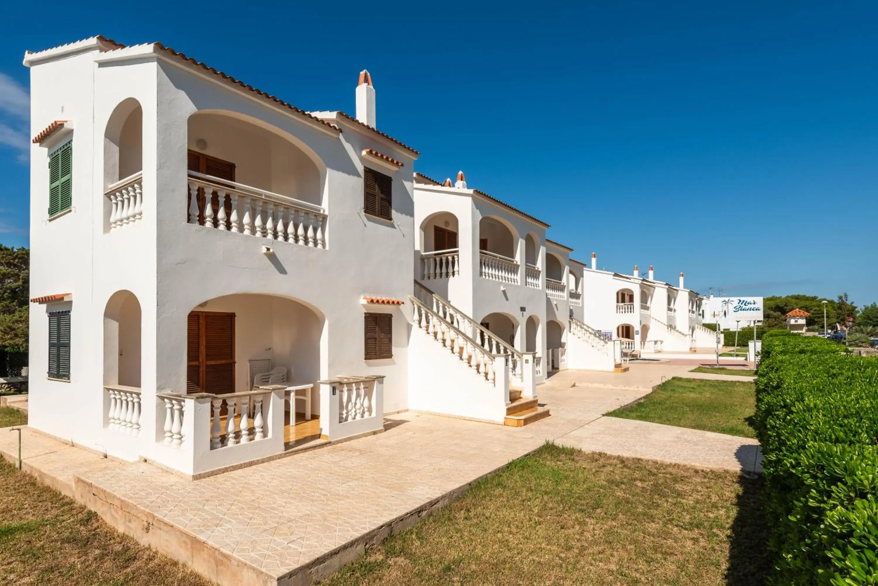 Property building in Apartamentos Mar Blanca by Mauter Villas Property building in Apartamentos Mar Blanca by Mauter Villas