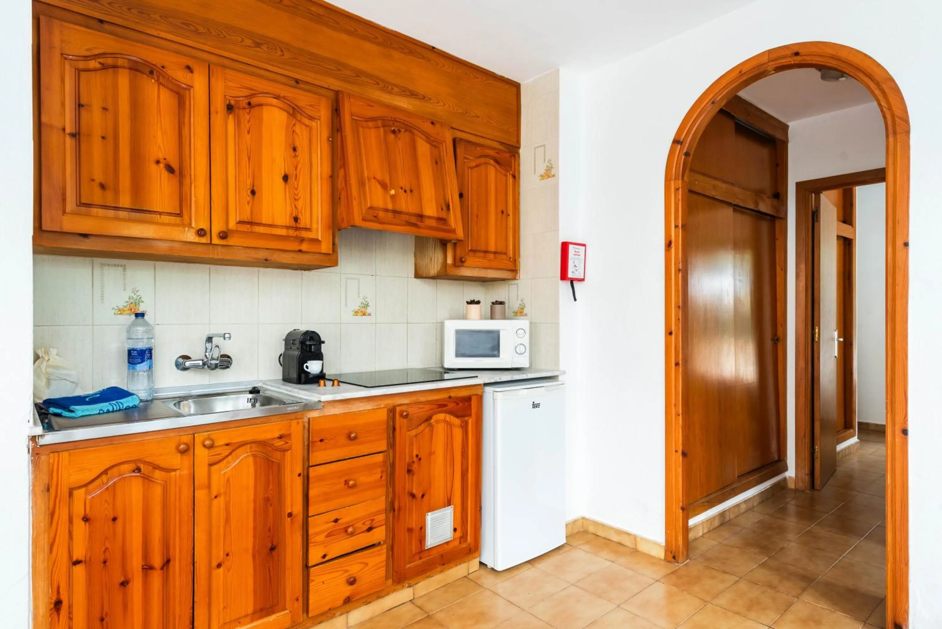 Kitchen or kitchenette in Apartamentos Mar Blanca by Mauter Villas