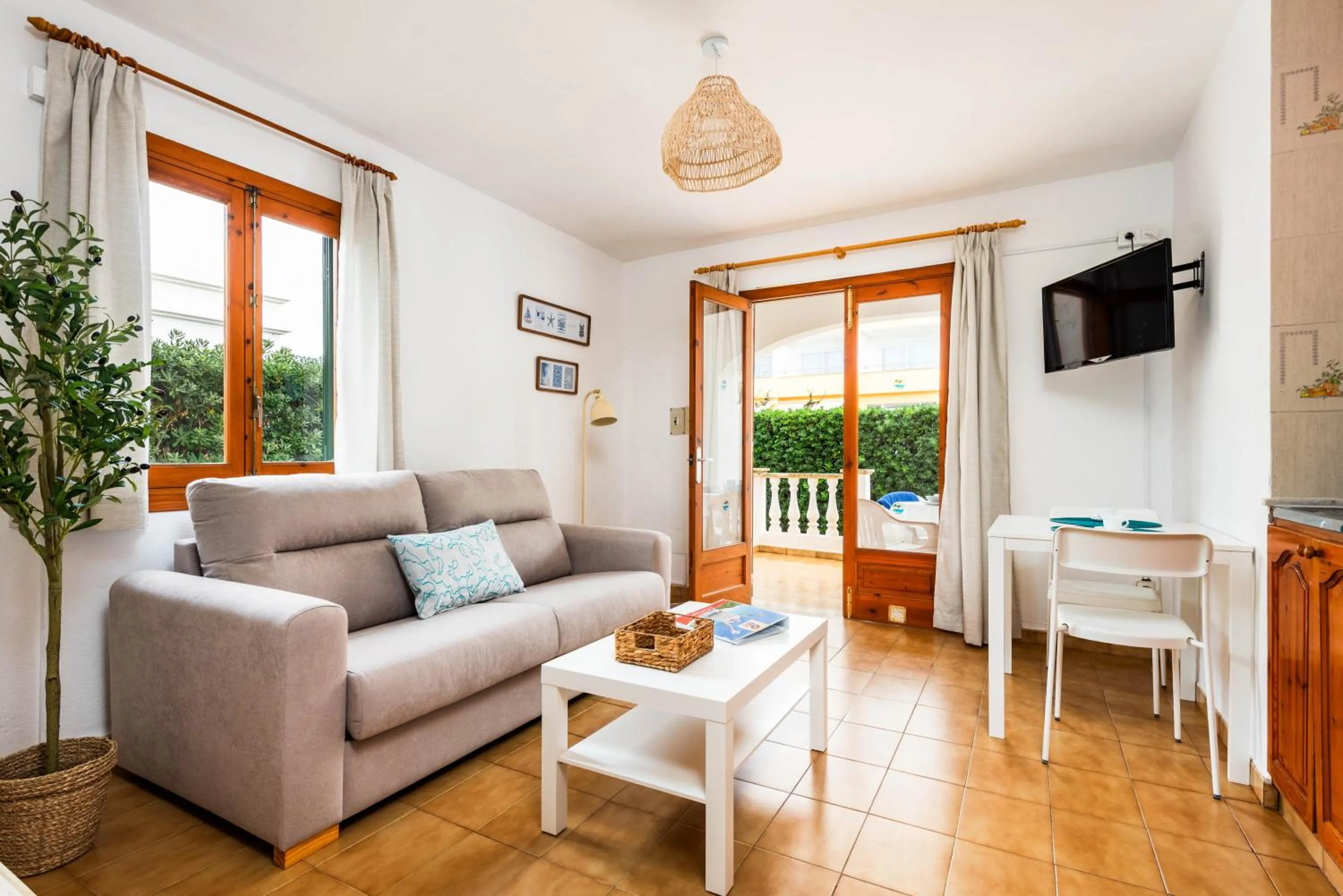 TV and multimedia in Apartamentos Mar Blanca by Mauter Villas