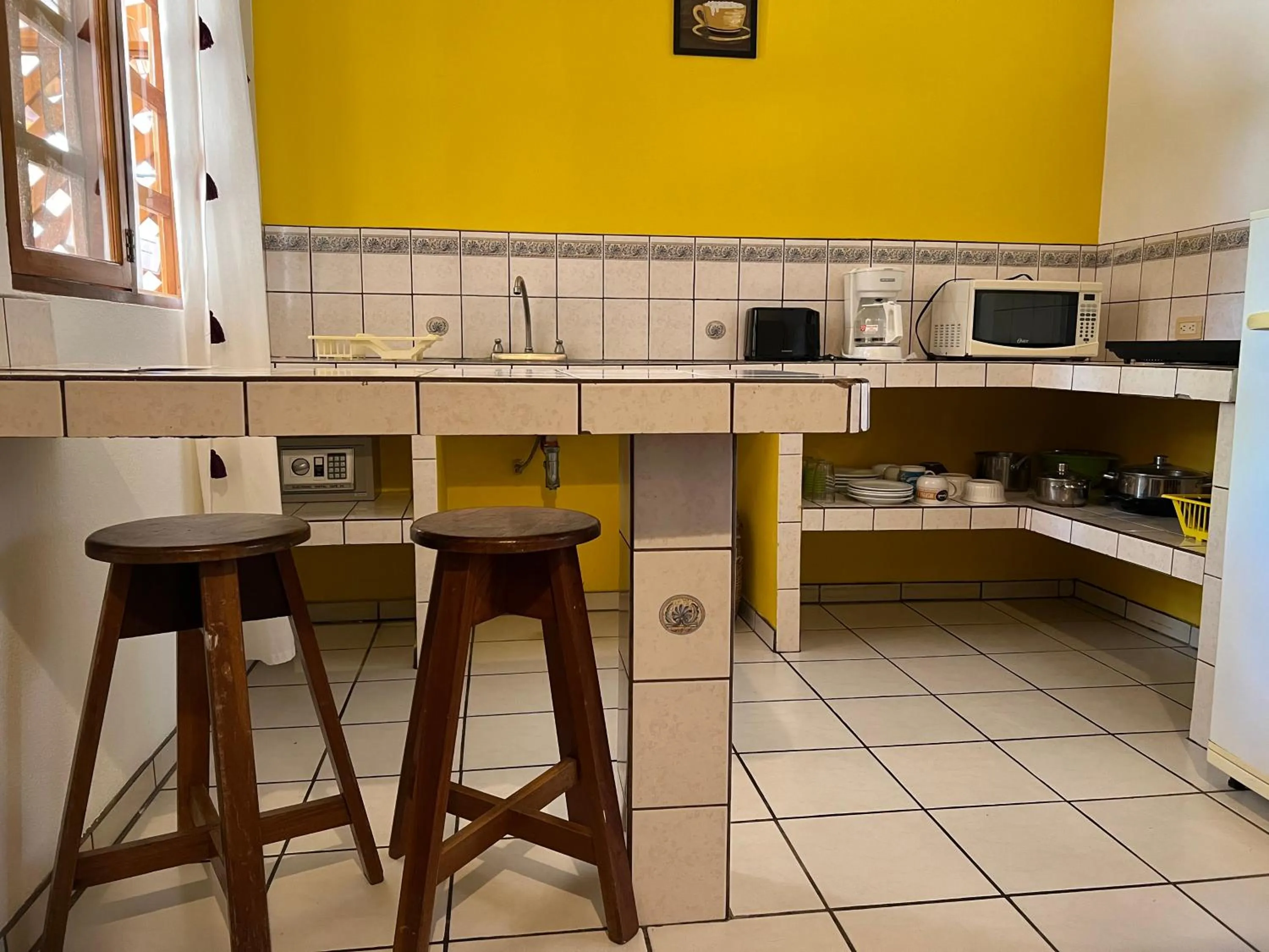 Kitchen or kitchenette in Cabinas El Colibri, Apart Hotel
