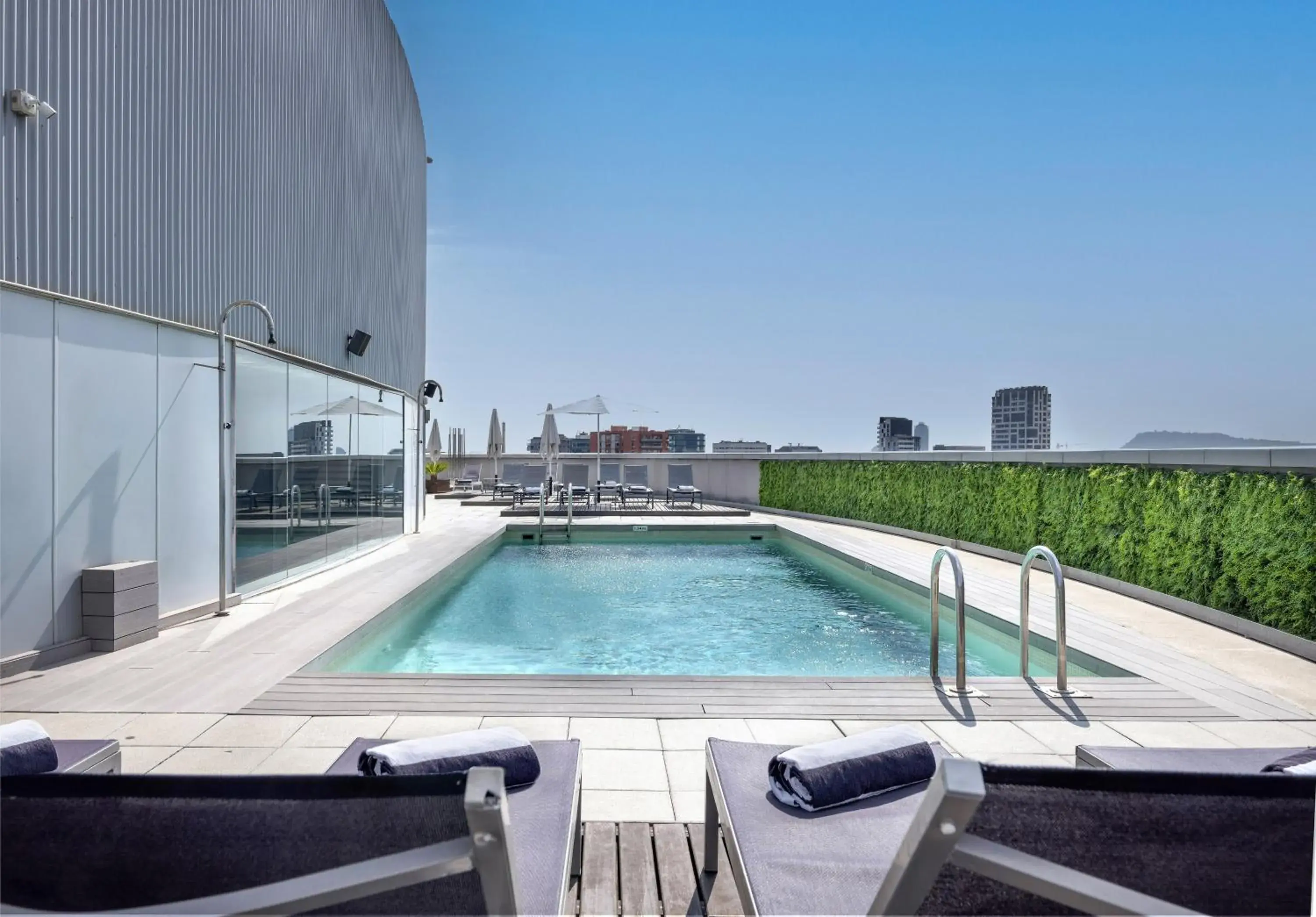 Swimming pool in Hotel Barcelona Condal Mar Affiliated by Meliá Swimming pool in Hotel Barcelona Condal Mar Affiliated by Meliá