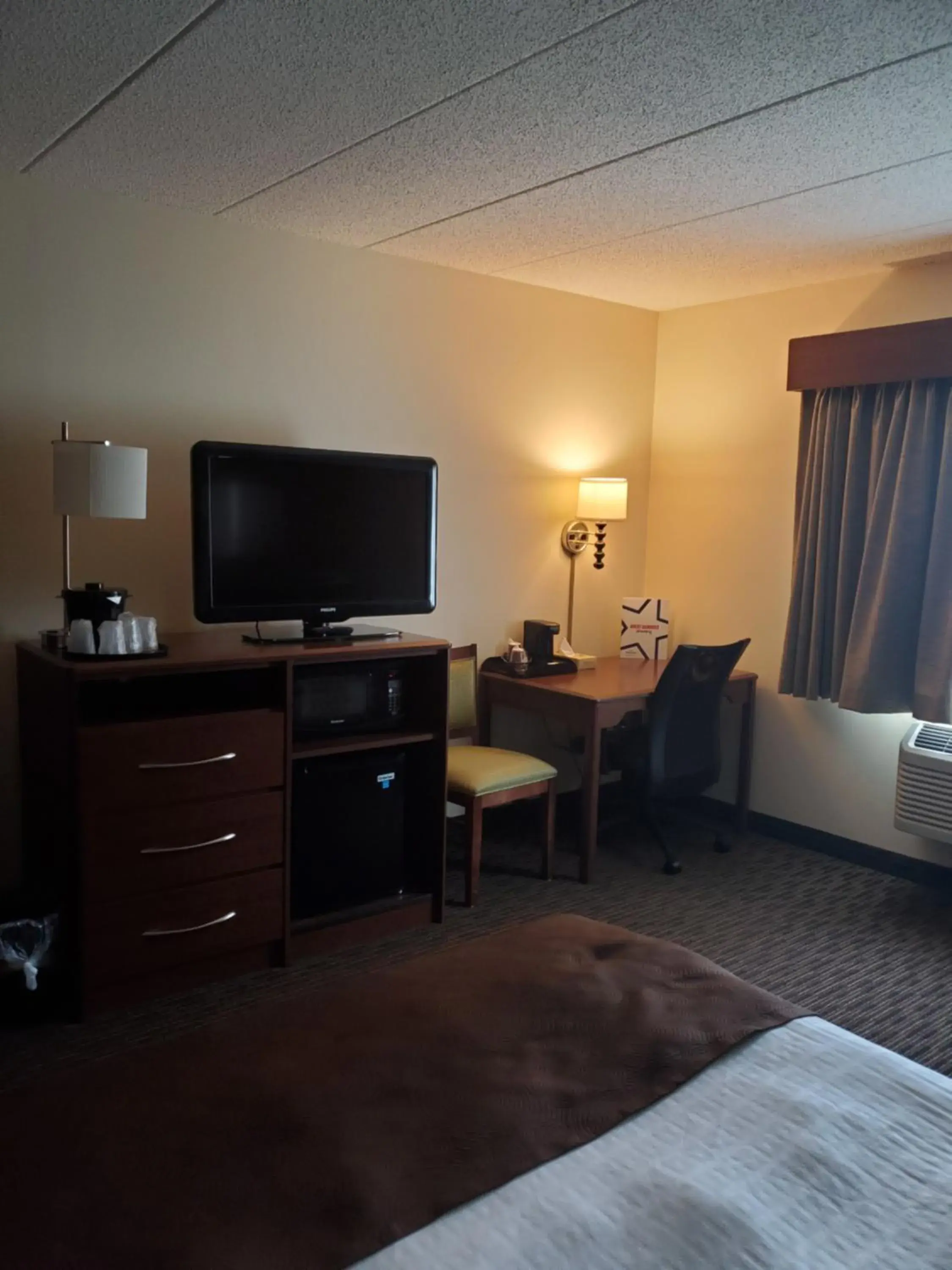 Bed in AmericInn by Wyndham Rice Lake Bed in AmericInn by Wyndham Rice Lake