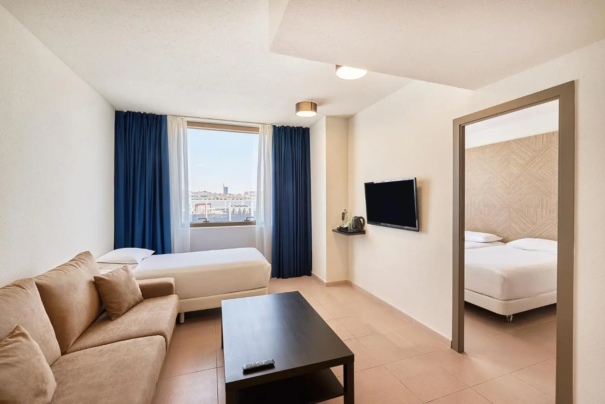 Living room, Bed in Hesperia Sant Joan Living room, Bed in Hesperia Sant Joan