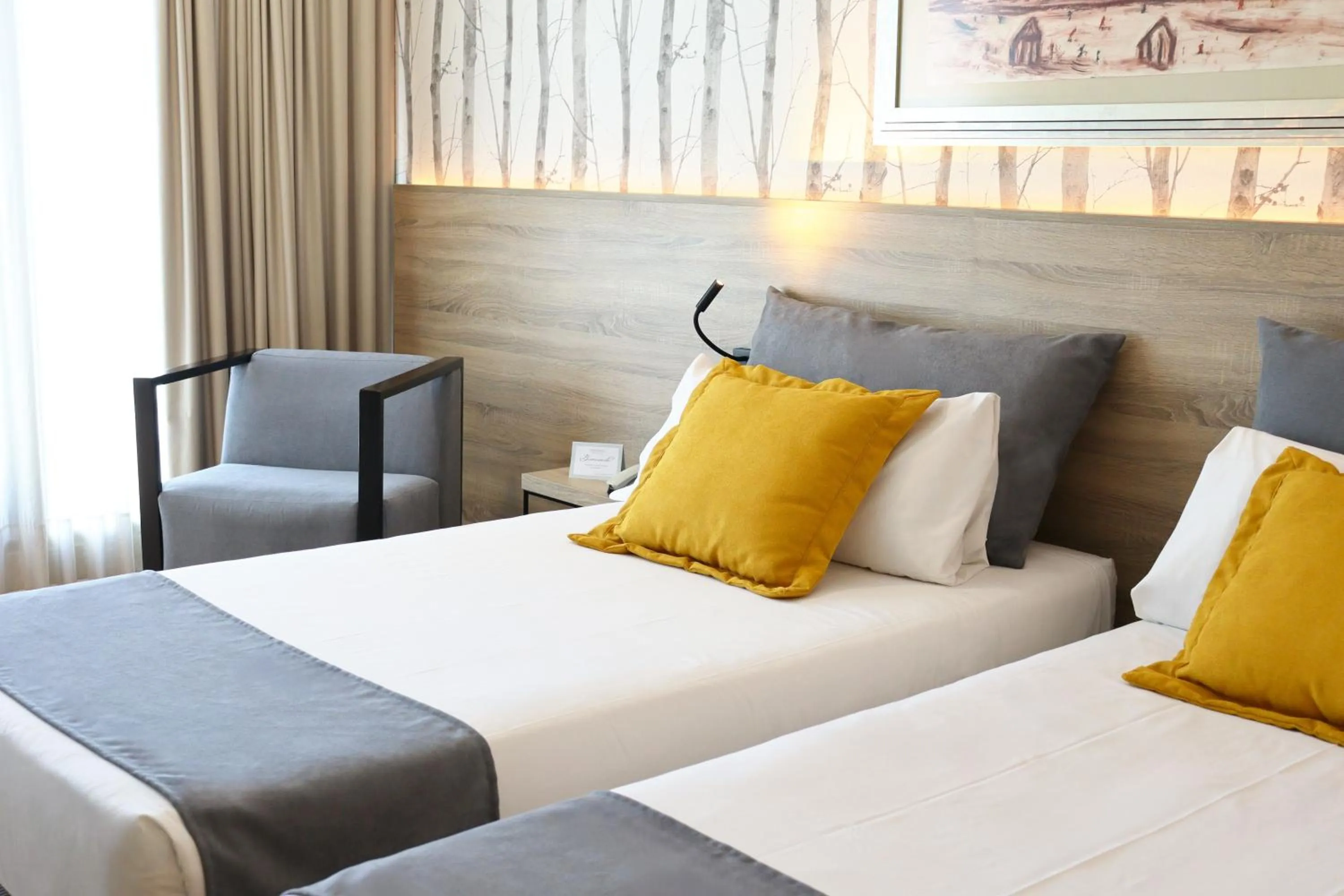 Bed in Eurohotel Barcelona Granvia Fira