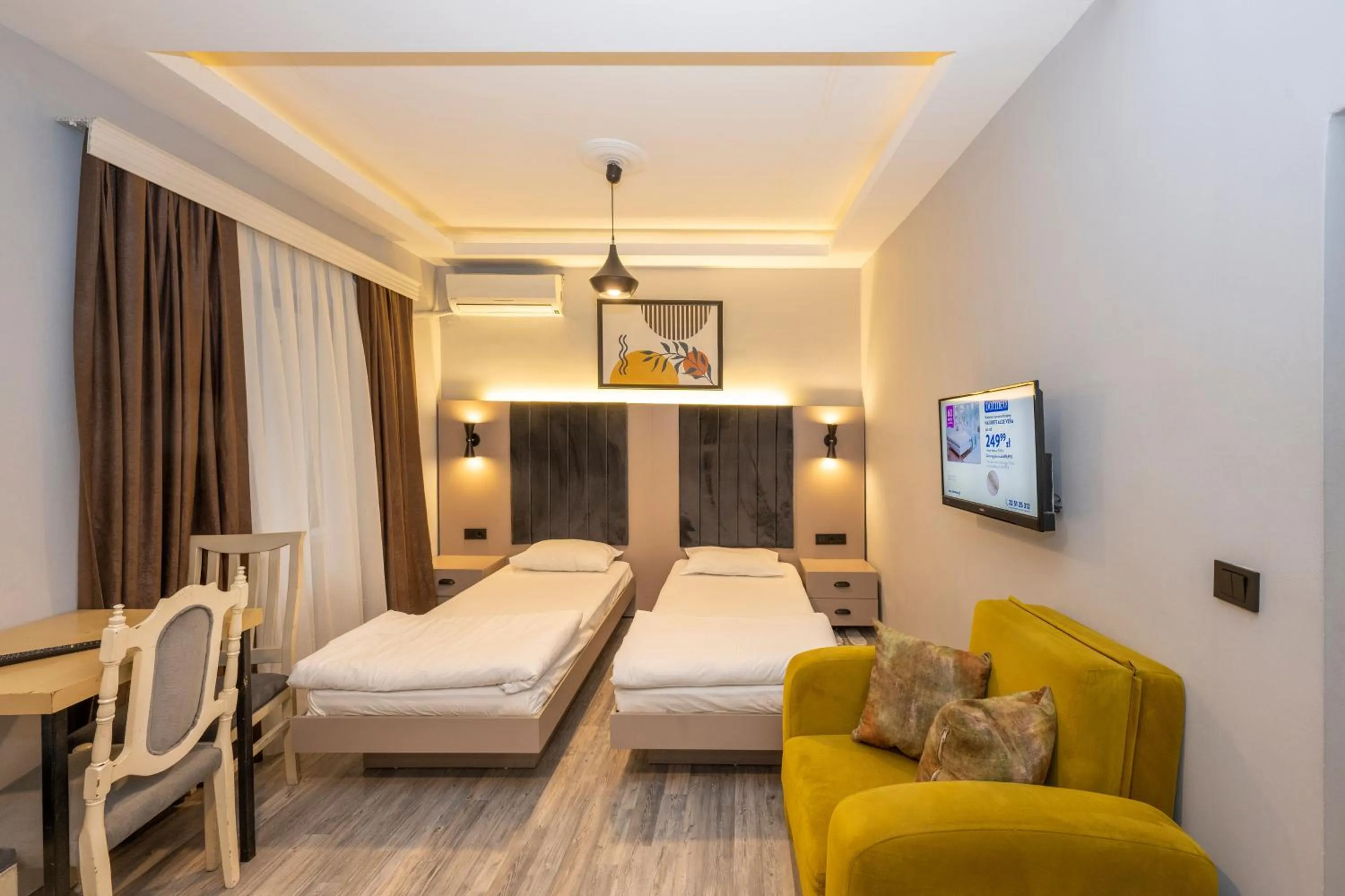 Bed in Cirrus Suites