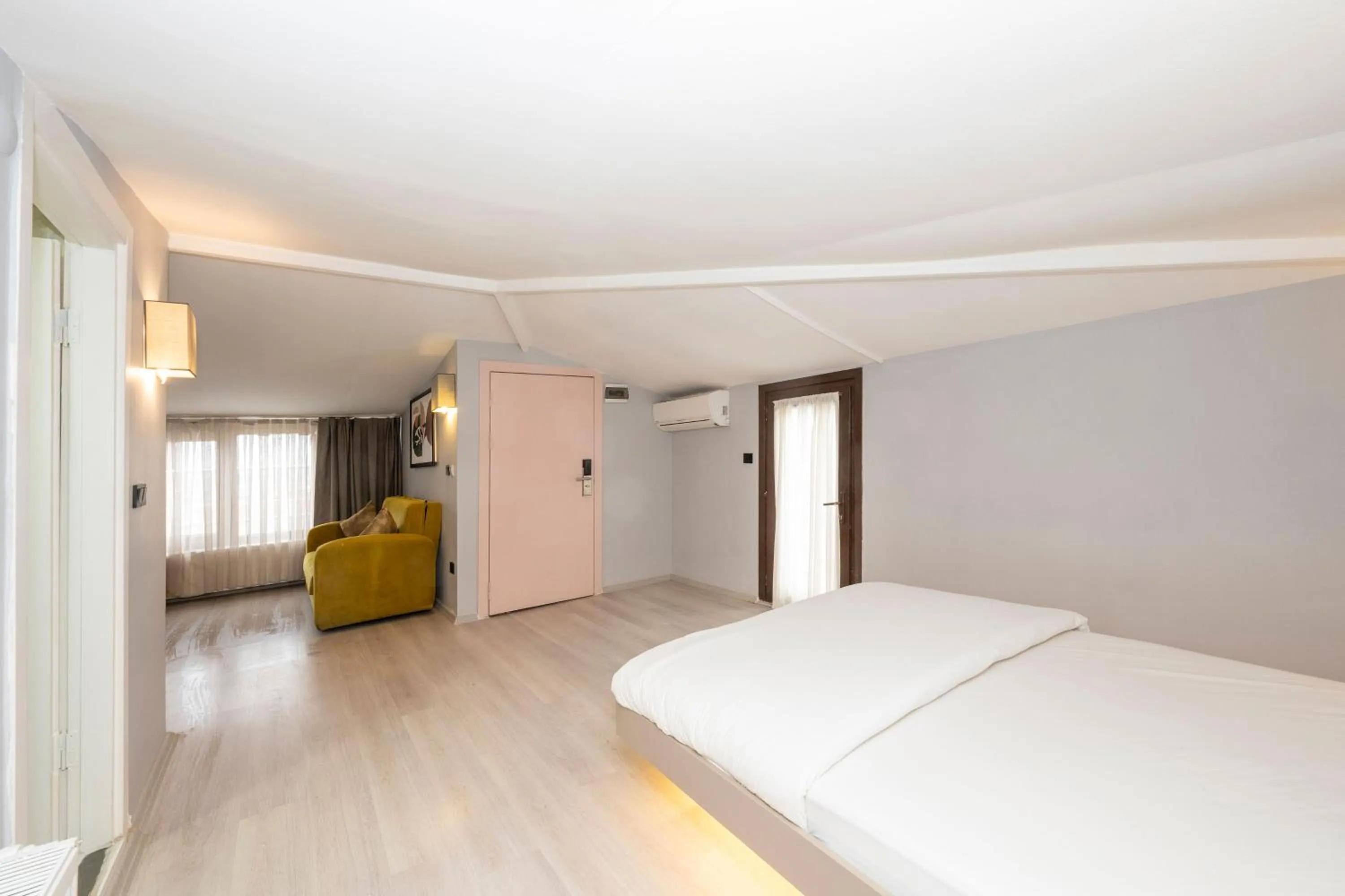 Bed in Cirrus Suites