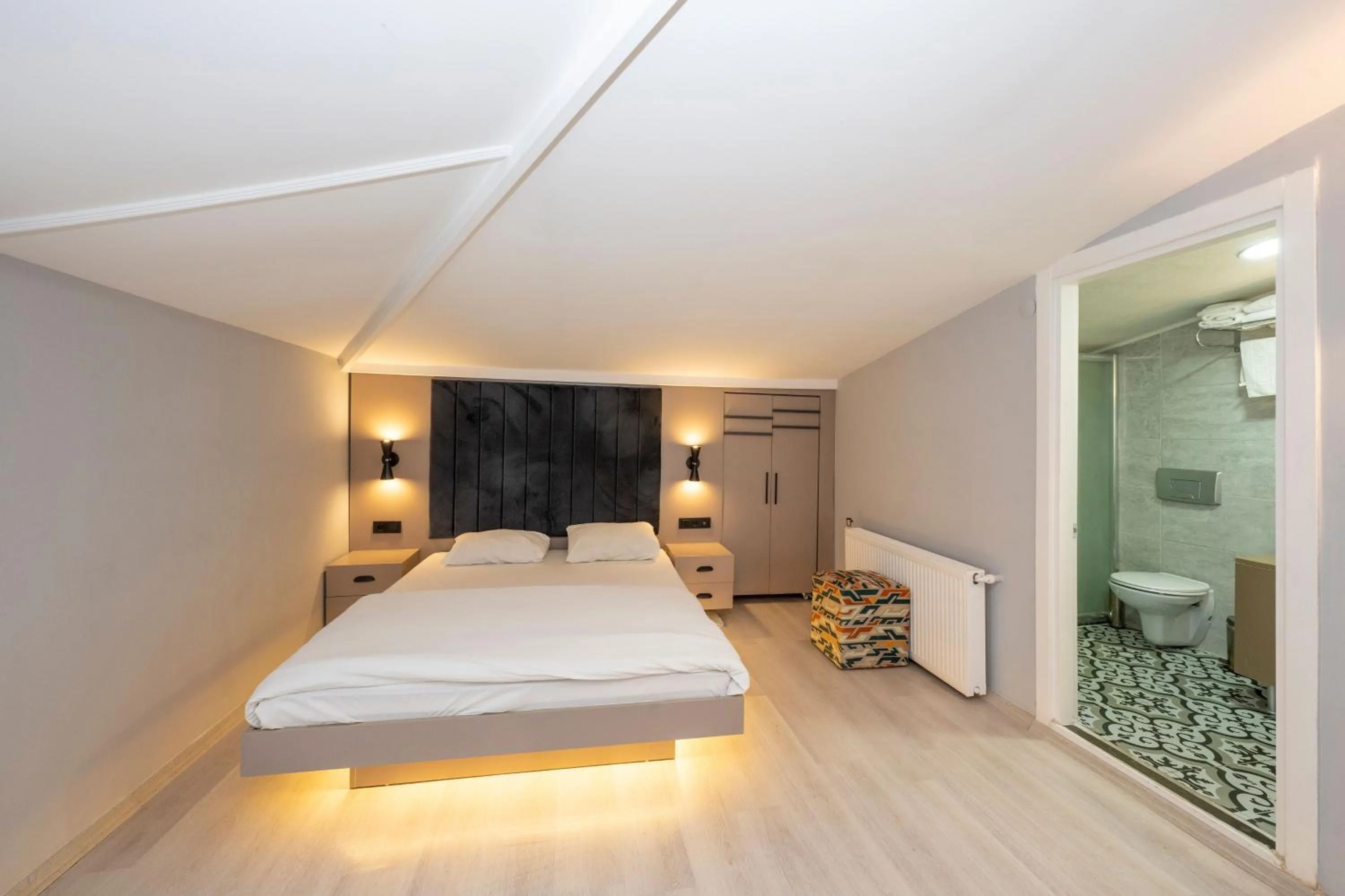 Bed in Cirrus Suites