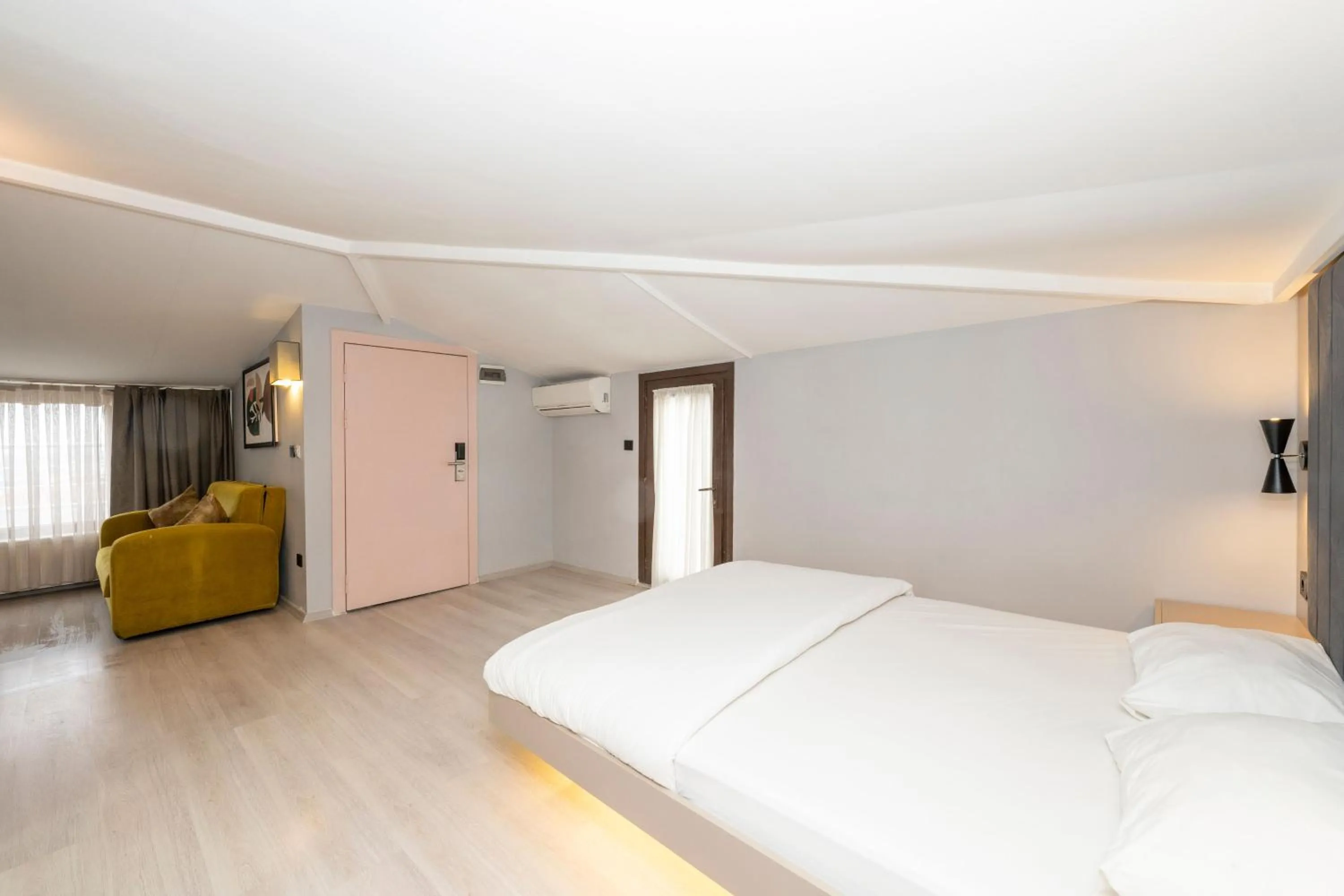 Bed in Cirrus Suites