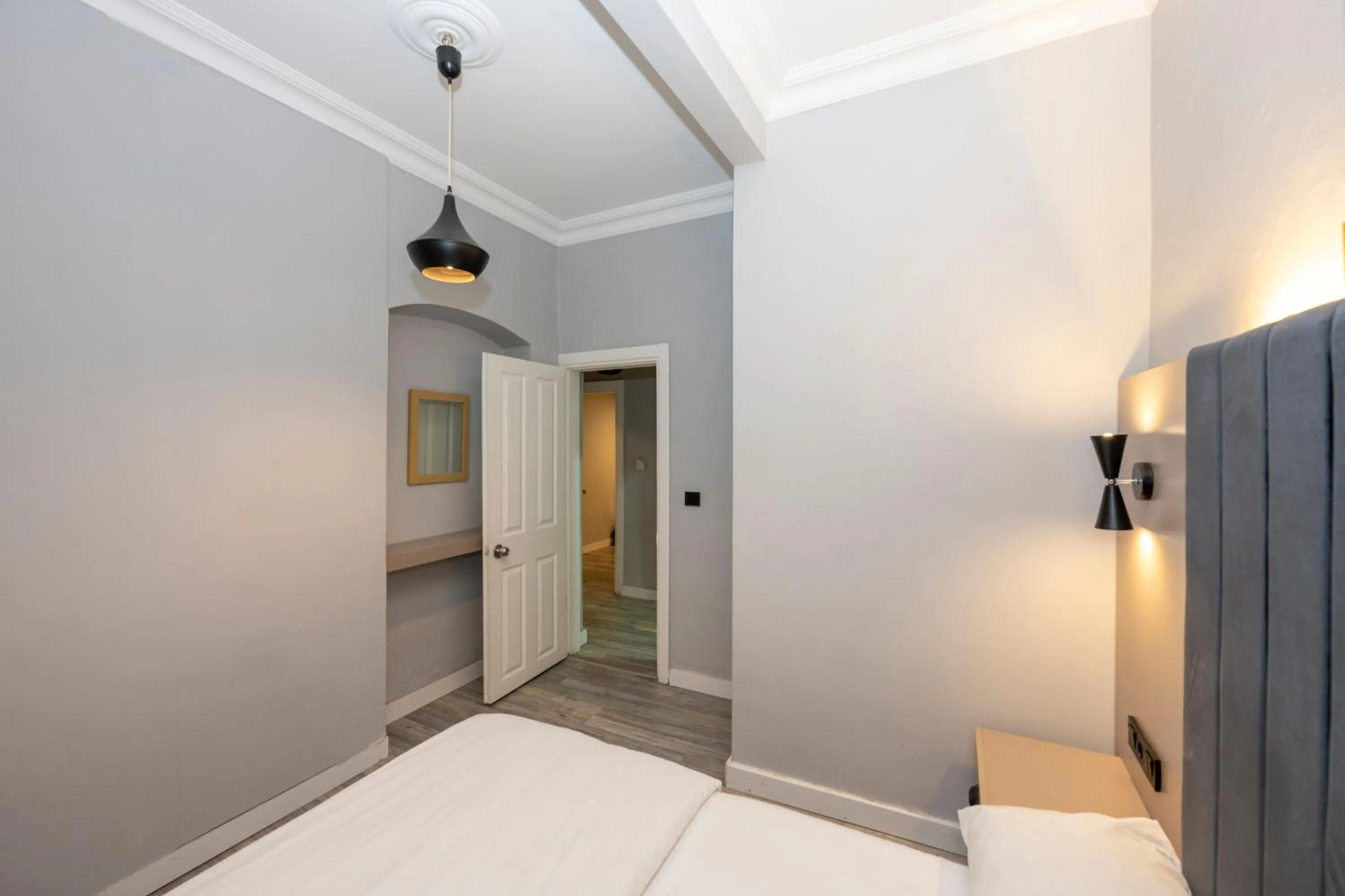 Bed in Cirrus Suites