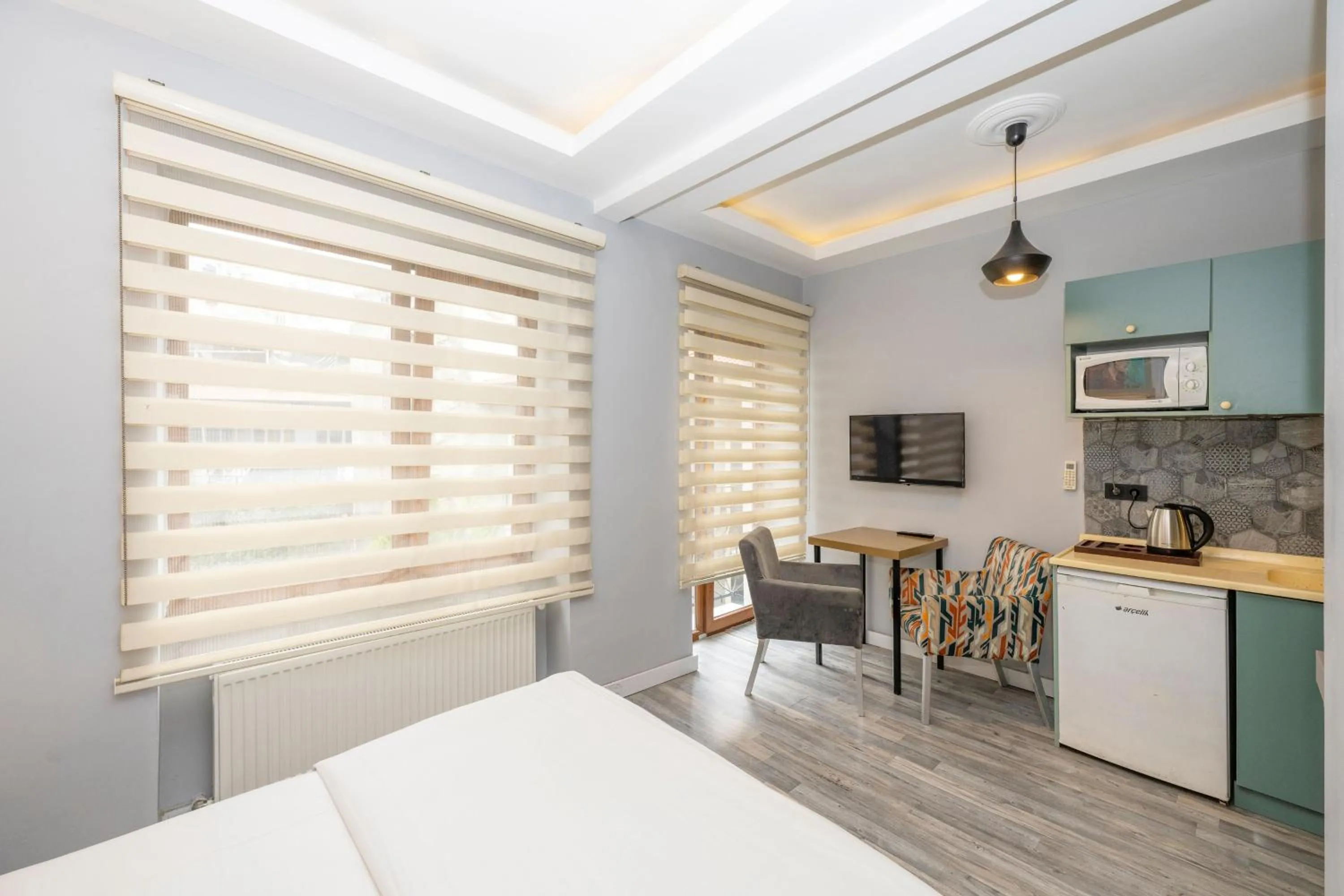 Bed in Cirrus Suites