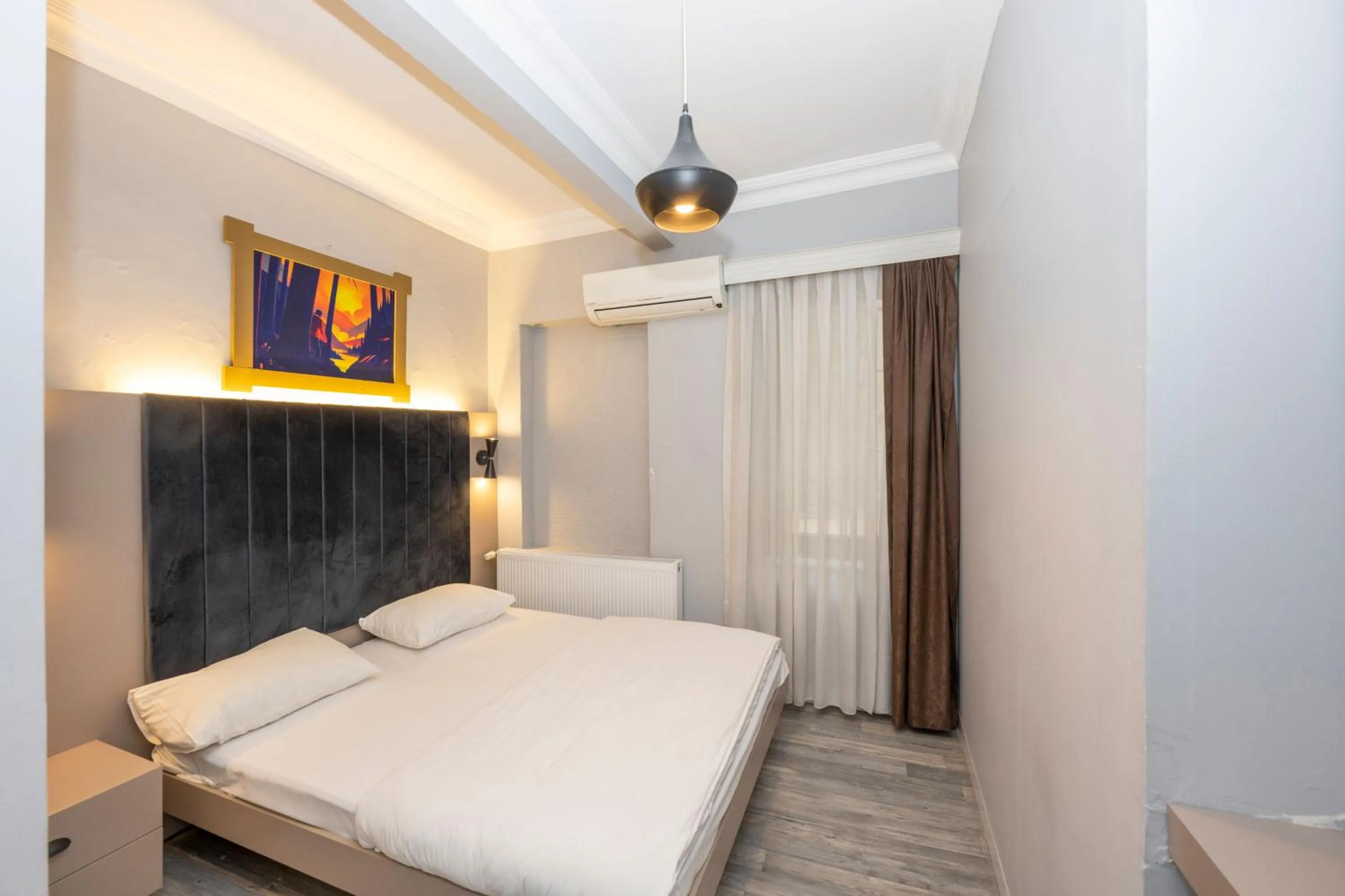 Bed in Cirrus Suites