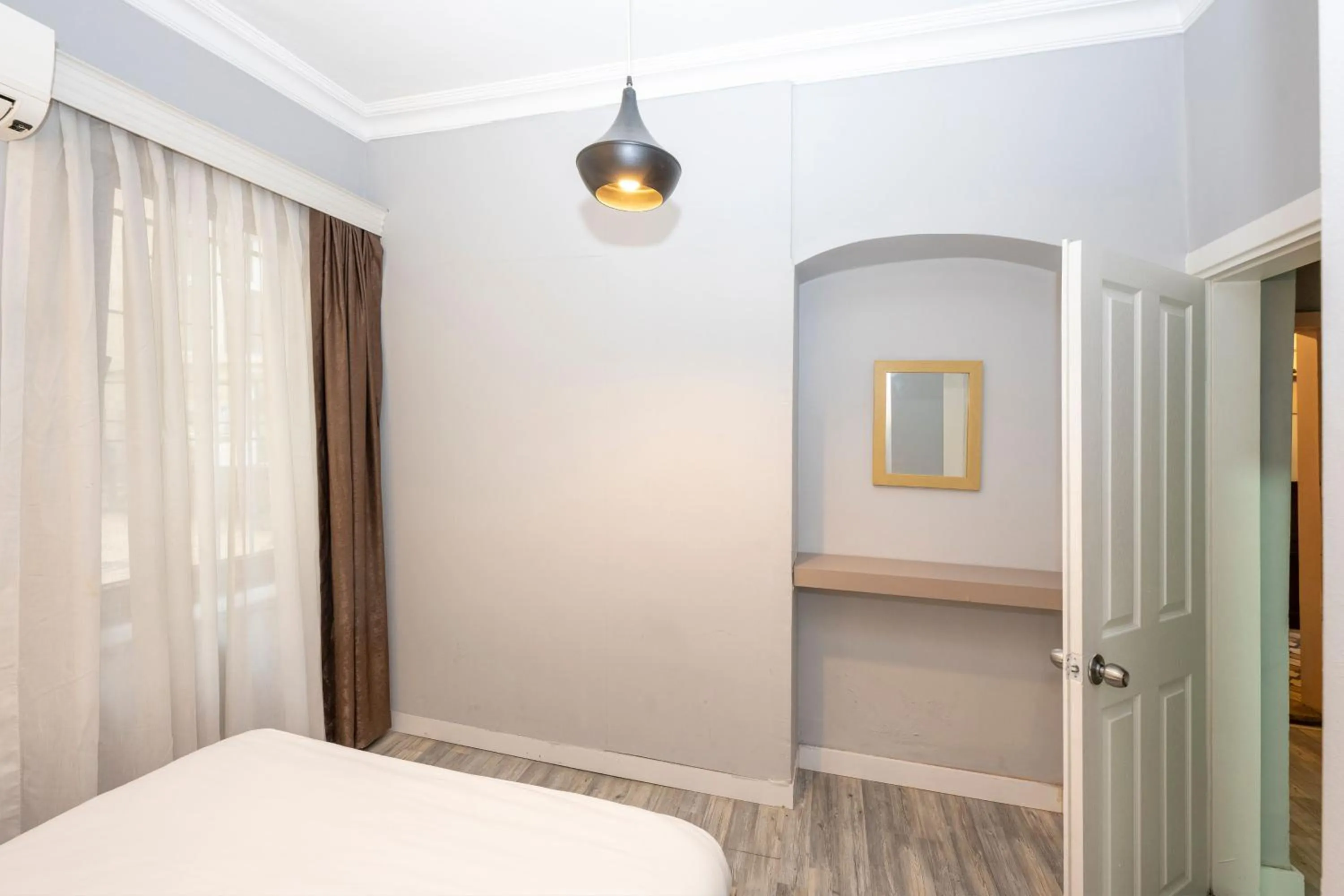 Bed in Cirrus Suites