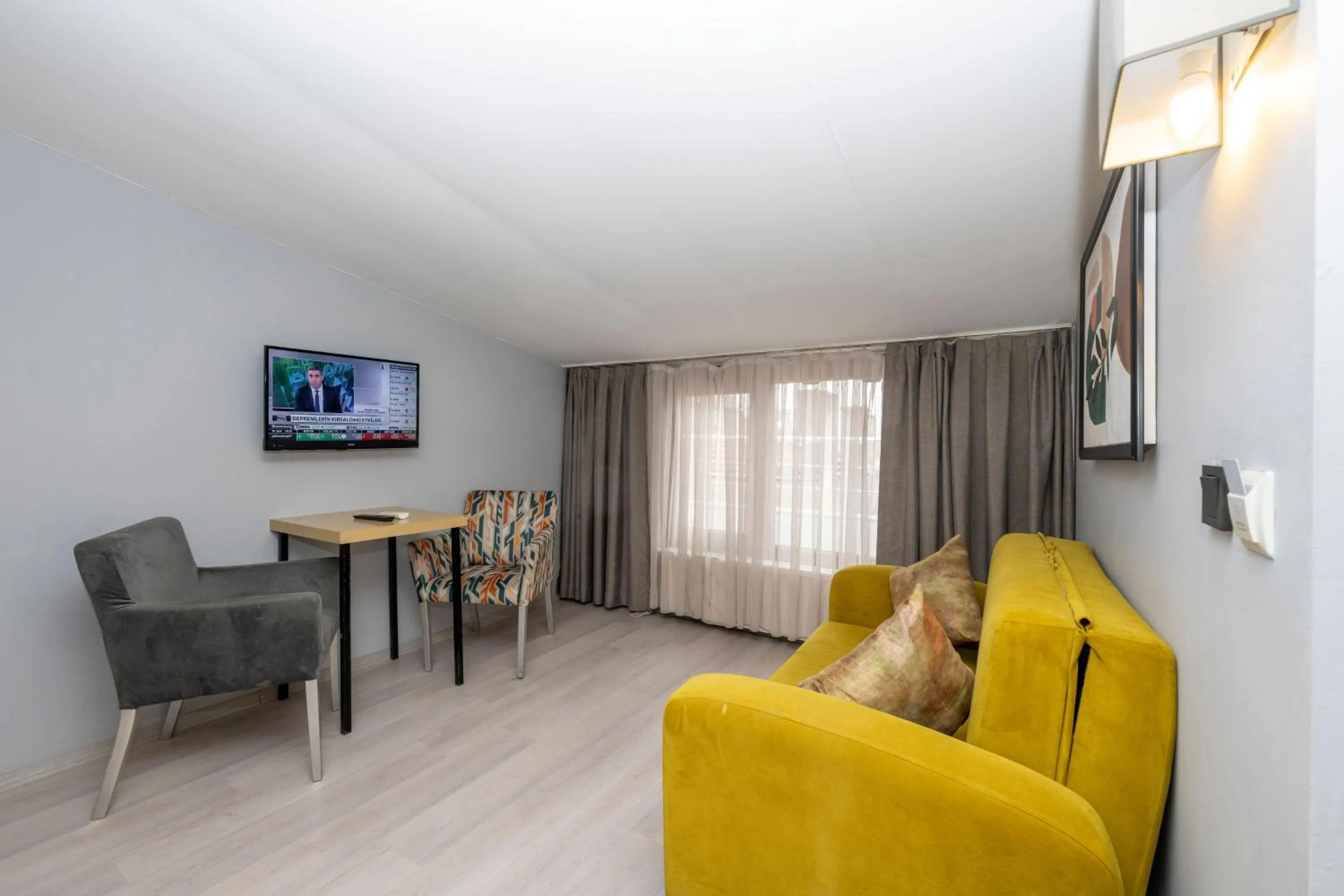 Communal lounge/ TV room in Cirrus Suites