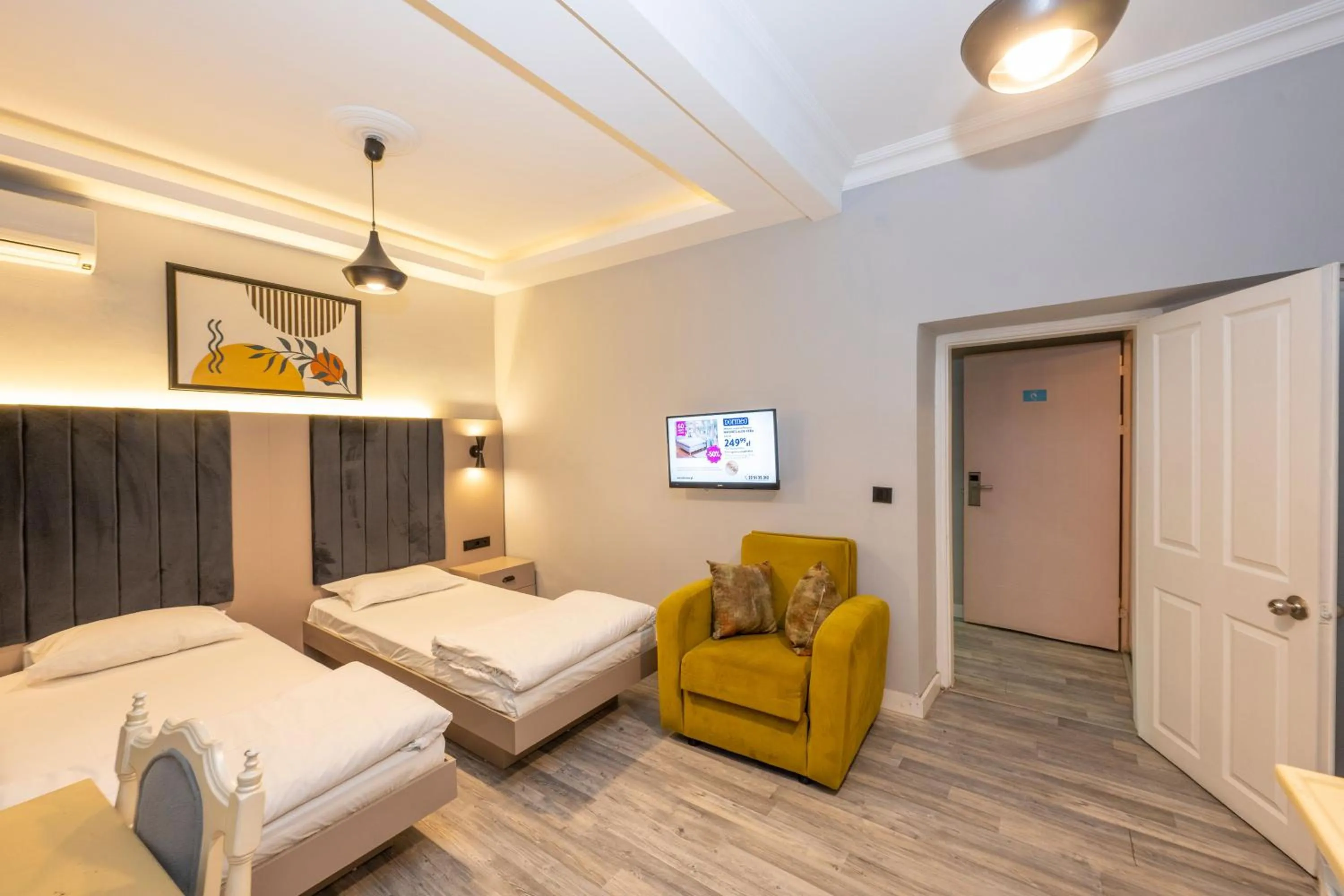 Bed in Cirrus Suites