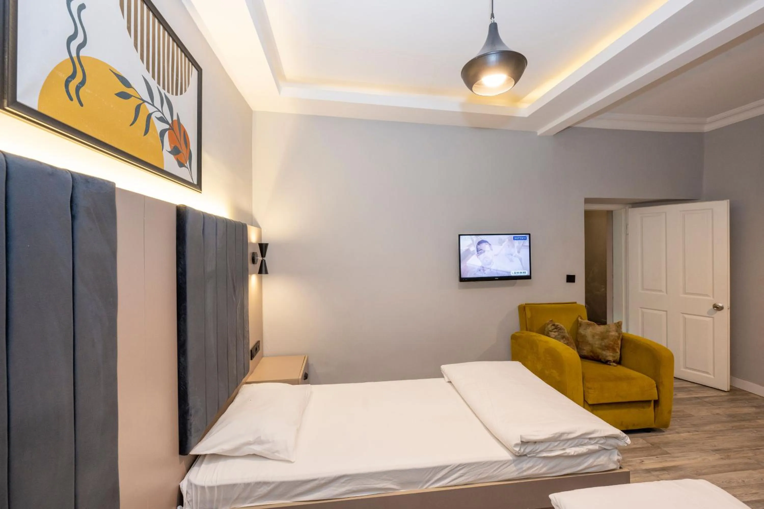 Bed in Cirrus Suites