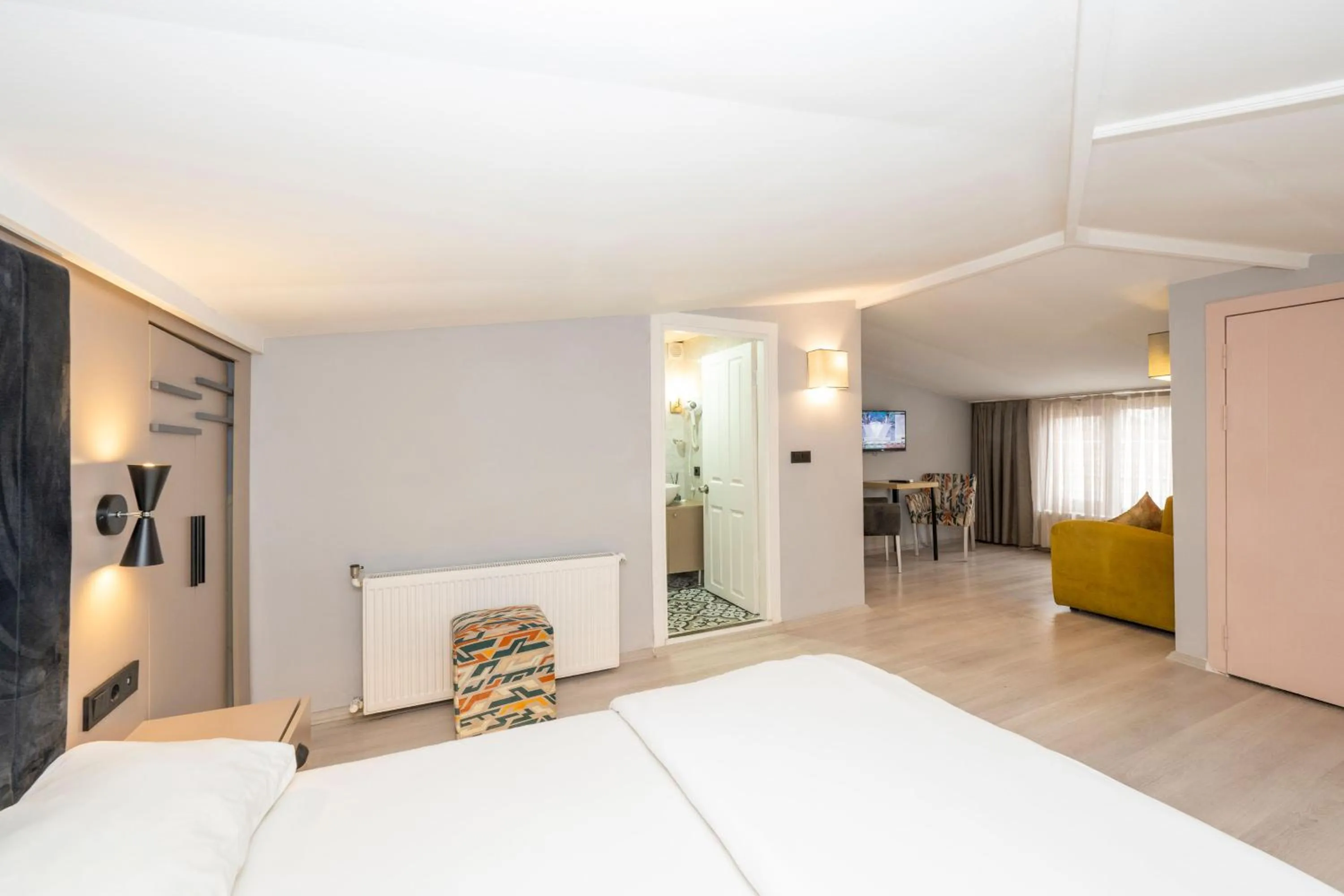 Bed in Cirrus Suites