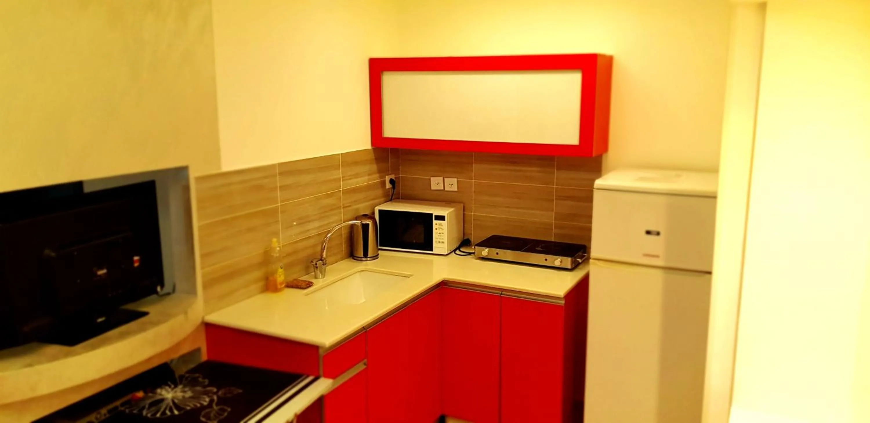 Kitchen or kitchenette in City Apartments